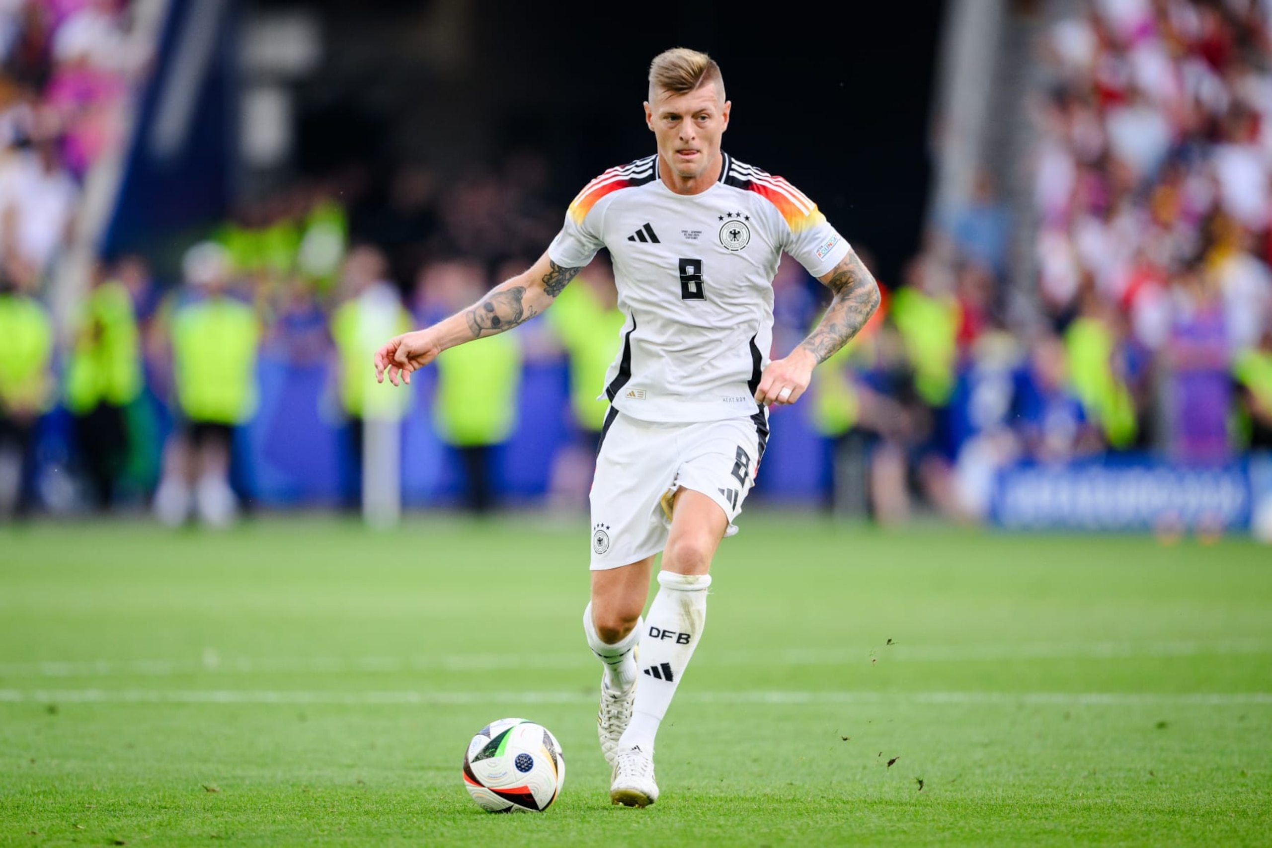 STUTTGART, GERMANY - JULY 05: Toni Kroos of Germany controls the ball during the UEFA EURO 2024 quarter-final match between Spain and Germany at Stuttgart Arena on July 05, 2024 in Stuttgart, Germany. (Photo by Marvin Ibo Guengoer - GES Sportfoto/Getty Images)
