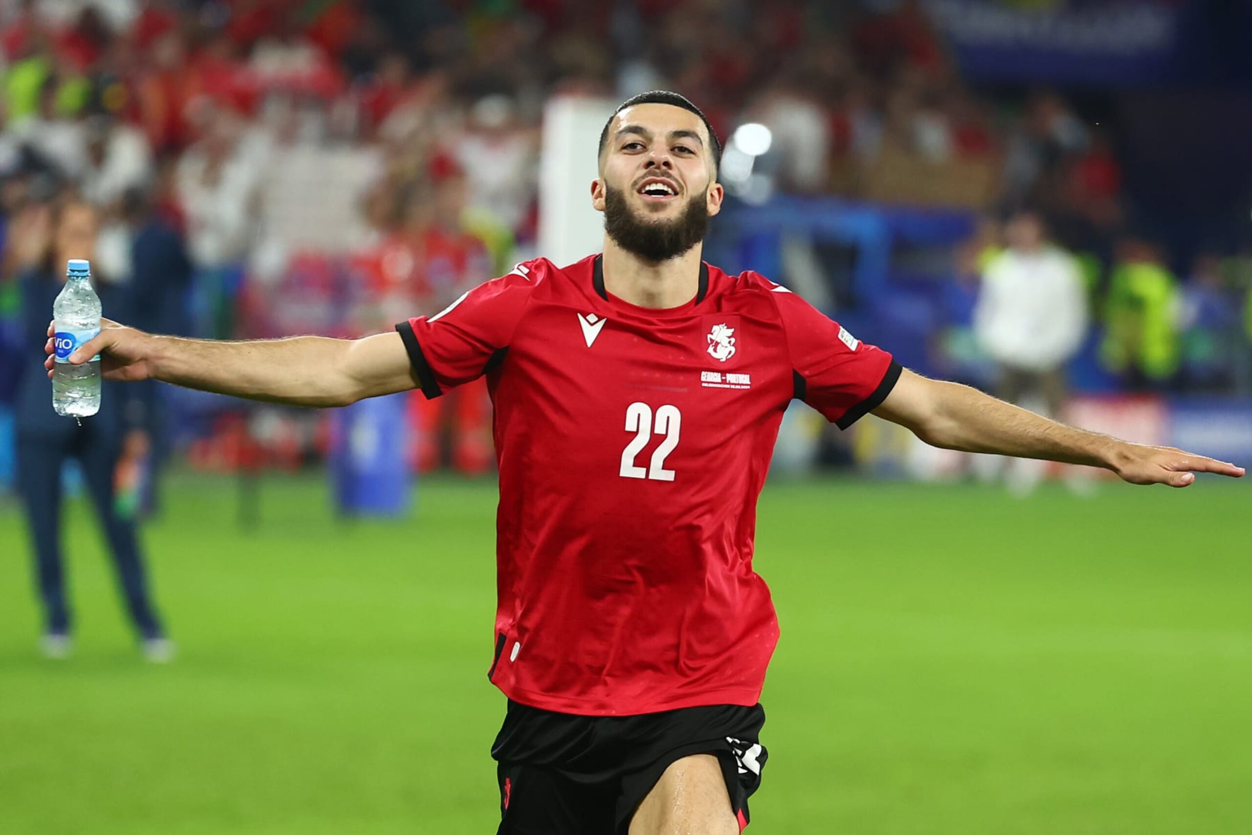 GELSENKIRCHEN, GERMANY - JUNE 26:  Georges Mikautadze of Georgia celebrates at the end of the UEFA EURO 2024 group stage match between Georgia and Portugal at Arena AufSchalke on June 26, 2024 in Gelsenkirchen, Germany.(Photo by Chris Brunskill/Fantasista/Getty Images)