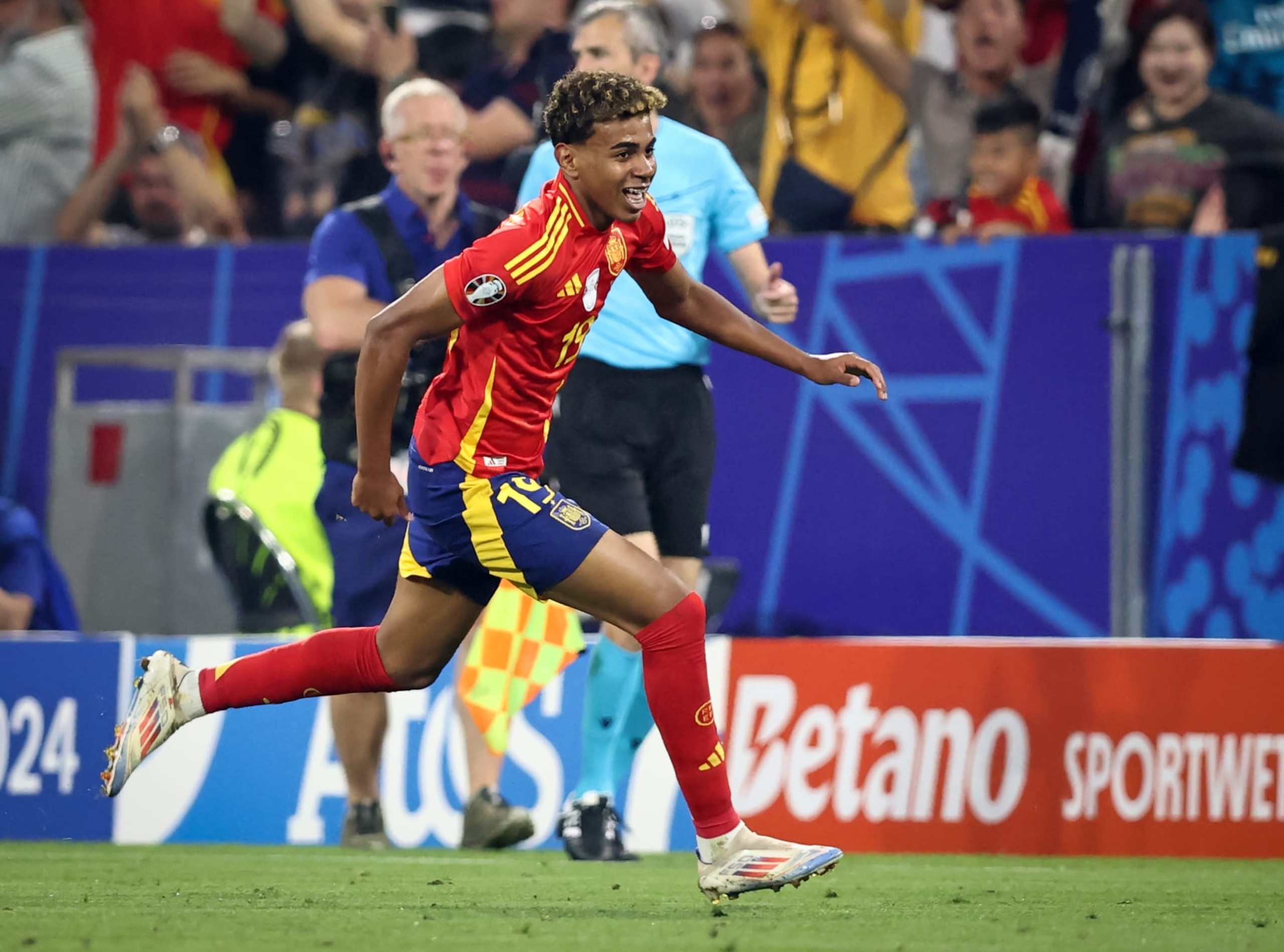MUNICH, GERMANY - JULY 09: Lamine Yamal of Spain celebrates as he scores the goal during the UEFA EURO 2024 semi-final match between Spain v France at Munich Football Arena on July 09, 2024 in Munich, Germany. (Photo by Stefan Matzke - sampics/Getty Images)