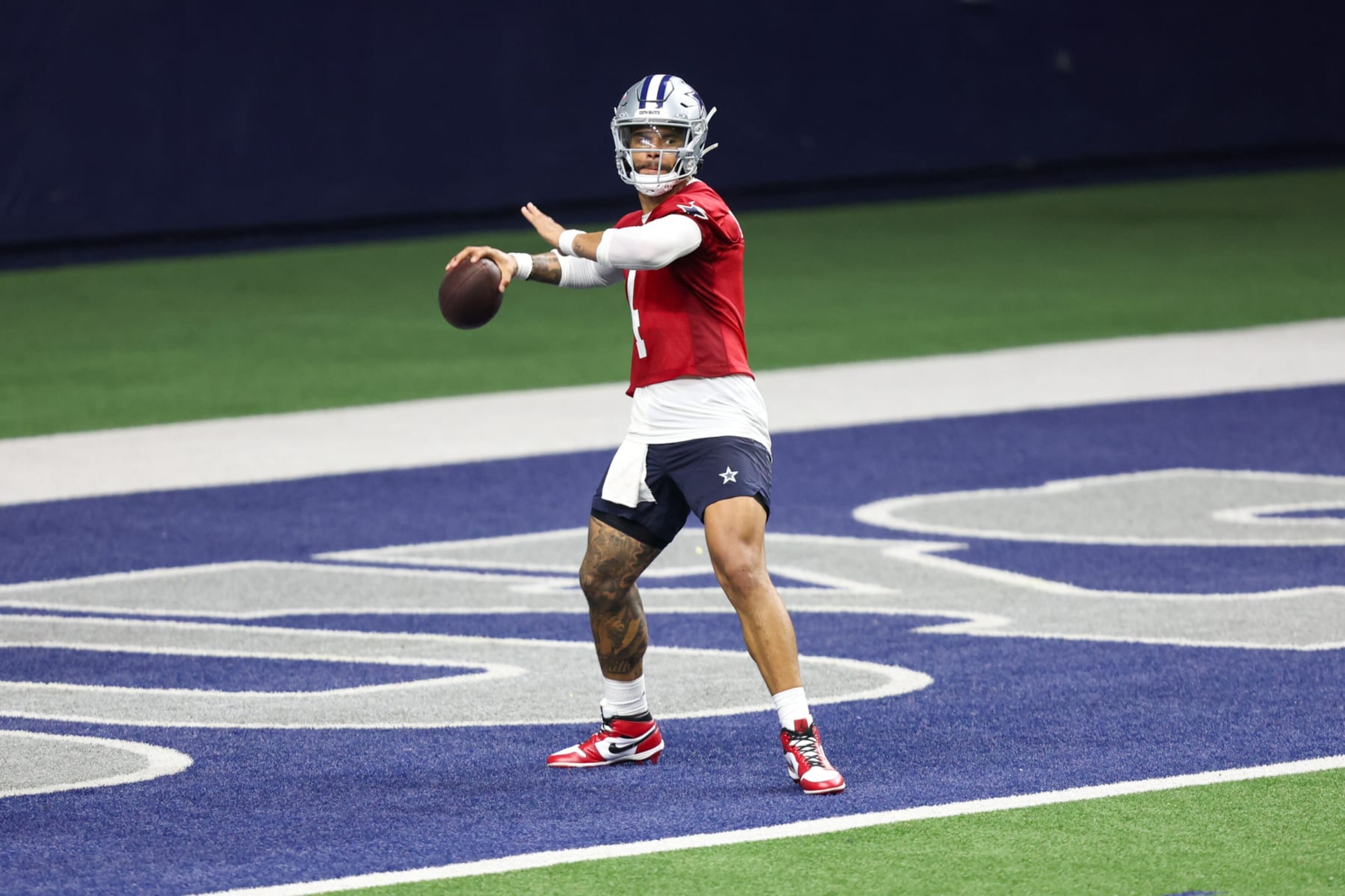 FRISCO, TX - MAY 22: Dallas Cowboys quarterback Dak Prescott (4) passes during the Dallas Cowboys OTAs on May 22, 2024 at The Star in Frisco, TX. (Photo by George Walker/Icon Sportswire via Getty Images) FRISCO, TX - MAY 22: Dallas Cowboys quarterback Dak Prescott (4) passes during the Dallas Cowboys OTAs on May 22, 2024 at The Star in Frisco, TX. (Photo by George Walker/Icon Sportswire via Getty Images)