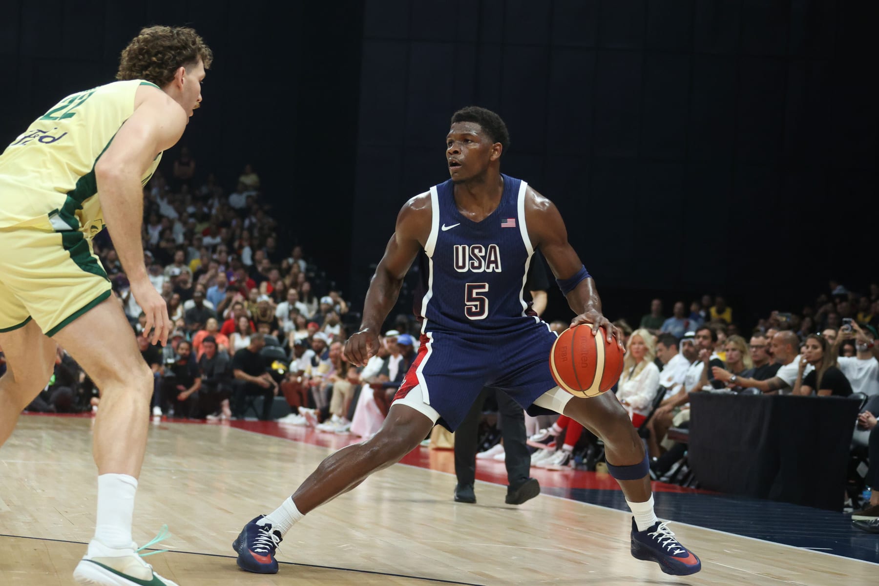 ABU DHABI, UAE - JULY 15: Anthony Edwards #5 of the USA Basketball Men's Team dribbles the ball during the game against the Australian Basketball Men's Team during the 2024 USA Basketball Showcase on July 15, 2024 in Abu Dhabi, The United Arab Emirates at Etihad Arena. NOTE TO USER: User expressly acknowledges and agrees that, by downloading and/or using this Photograph, user is consenting to the terms and conditions of the Getty Images License Agreement. Mandatory Copyright Notice: Copyright 2024 NBAE (Photo by Nathaniel S. Butler/NBAE via Getty Images)