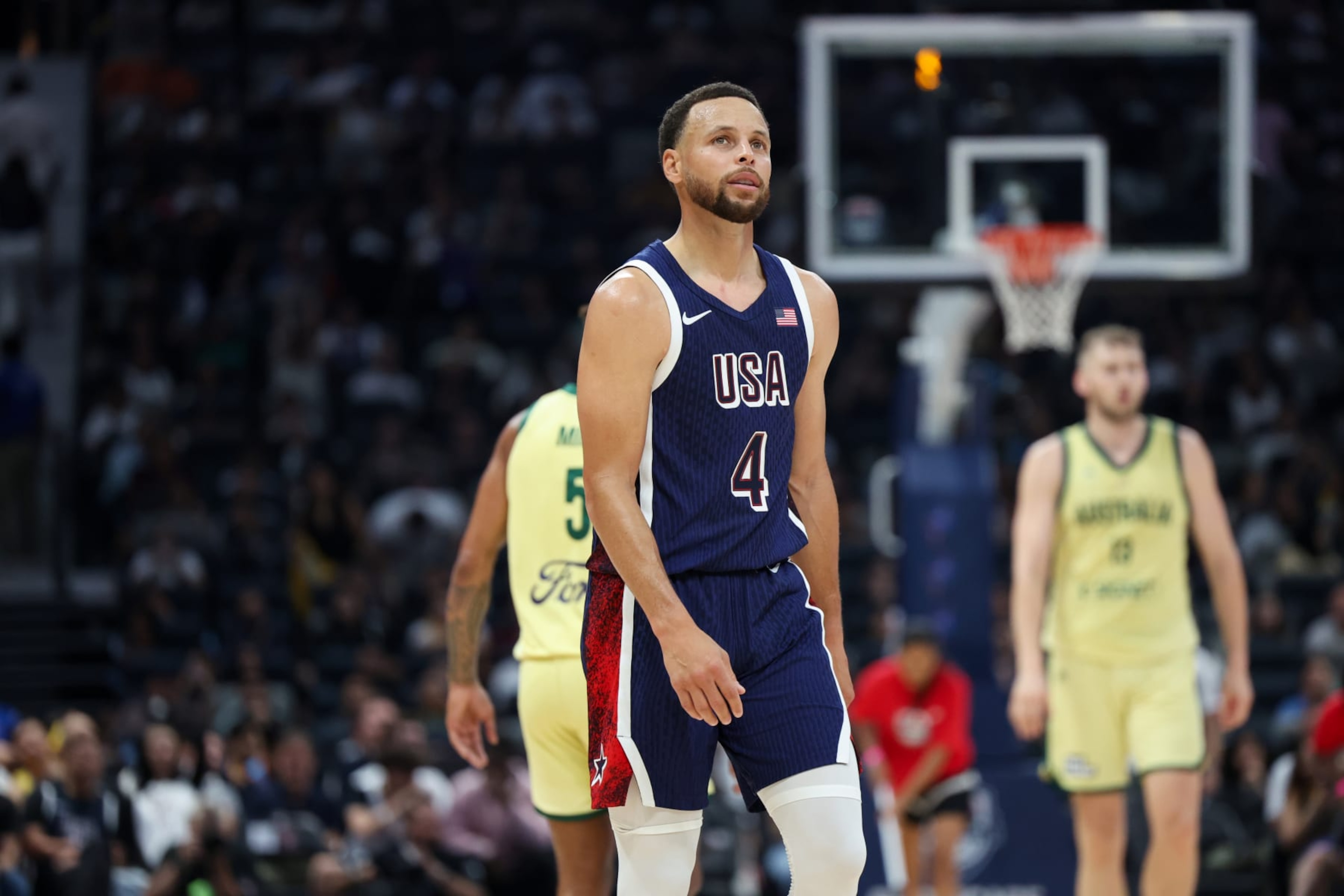 ABU DHABI, UAE - JULY 15: Stephen Curry #4 of Team USA looks on during the game against the Australian Basketball Men's Team during the 2024 USA Basketball Showcase on July 15, 2024 in Abu Dhabi, The United Arab Emirates at Etihad Arena. NOTE TO USER: User expressly acknowledges and agrees that, by downloading and/or using this Photograph, user is consenting to the terms and conditions of the Getty Images License Agreement. Mandatory Copyright Notice: Copyright 2024 NBAE (Photo by Joe Murphy/NBAE via Getty Images) ABU DHABI, UAE - JULY 15: Stephen Curry #4 of Team USA looks on during the game against the Australian Basketball Men's Team during the 2024 USA Basketball Showcase on July 15, 2024 in Abu Dhabi, The United Arab Emirates at Etihad Arena. NOTE TO USER: User expressly acknowledges and agrees that, by downloading and/or using this Photograph, user is consenting to the terms and conditions of the Getty Images License Agreement. Mandatory Copyright Notice: Copyright 2024 NBAE (Photo by Joe Murphy/NBAE via Getty Images)