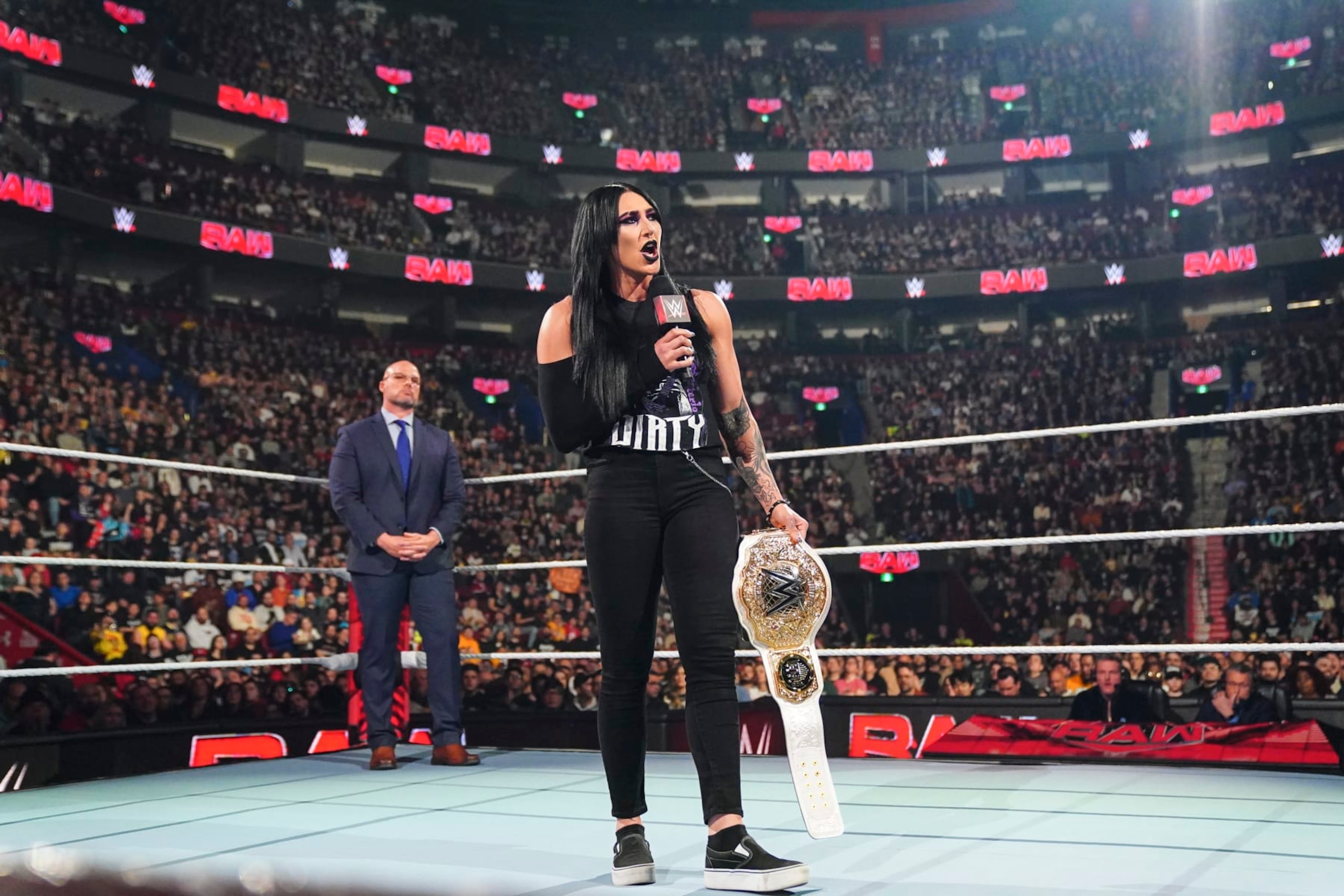 MONTREAL, CANADA - APRIL 15: Rhea Ripley relinquishes the Women's World Championship during Monday Night RAW at the Bell Centre on April 15, 2024 in Montreal, Canada.  (Photo by WWE/Getty Images)
