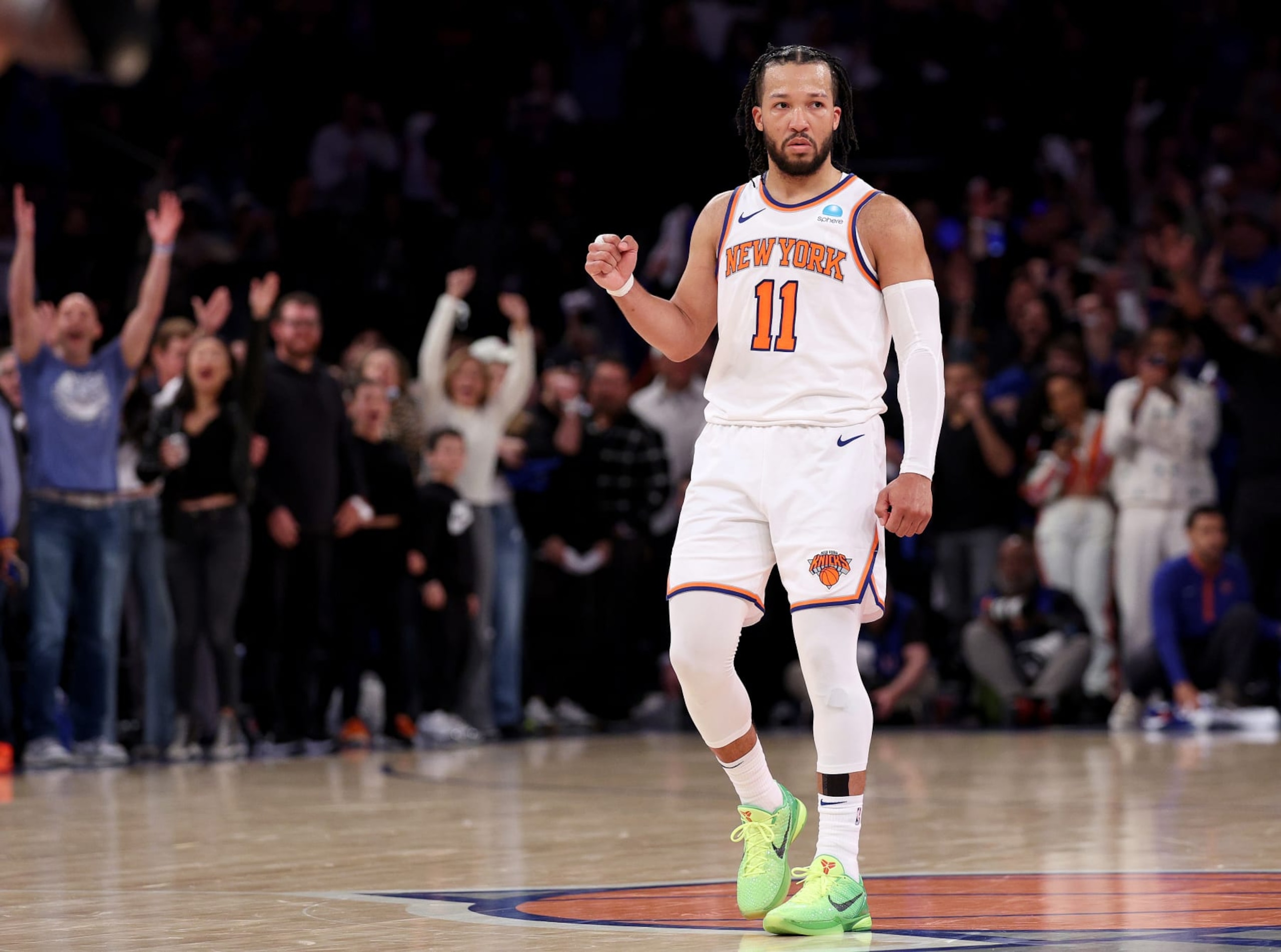 NEW YORK, NEW YORK - APRIL 20: Jalen Brunson #11 of the New York Knicks celebrates late in the fourth quarter against the Philadelphia 76ers in game one of the Eastern Conference First Round Playoffs at Madison Square Garden on April 20, 2024 in New York City. The New York Knicks defeated the Philadelphia 76ers 111-104. NOTE TO USER: User expressly acknowledges and agrees that, by downloading and or using this photograph, User is consenting to the terms and conditions of the Getty Images License Agreement. (Photo by Elsa/Getty Images)