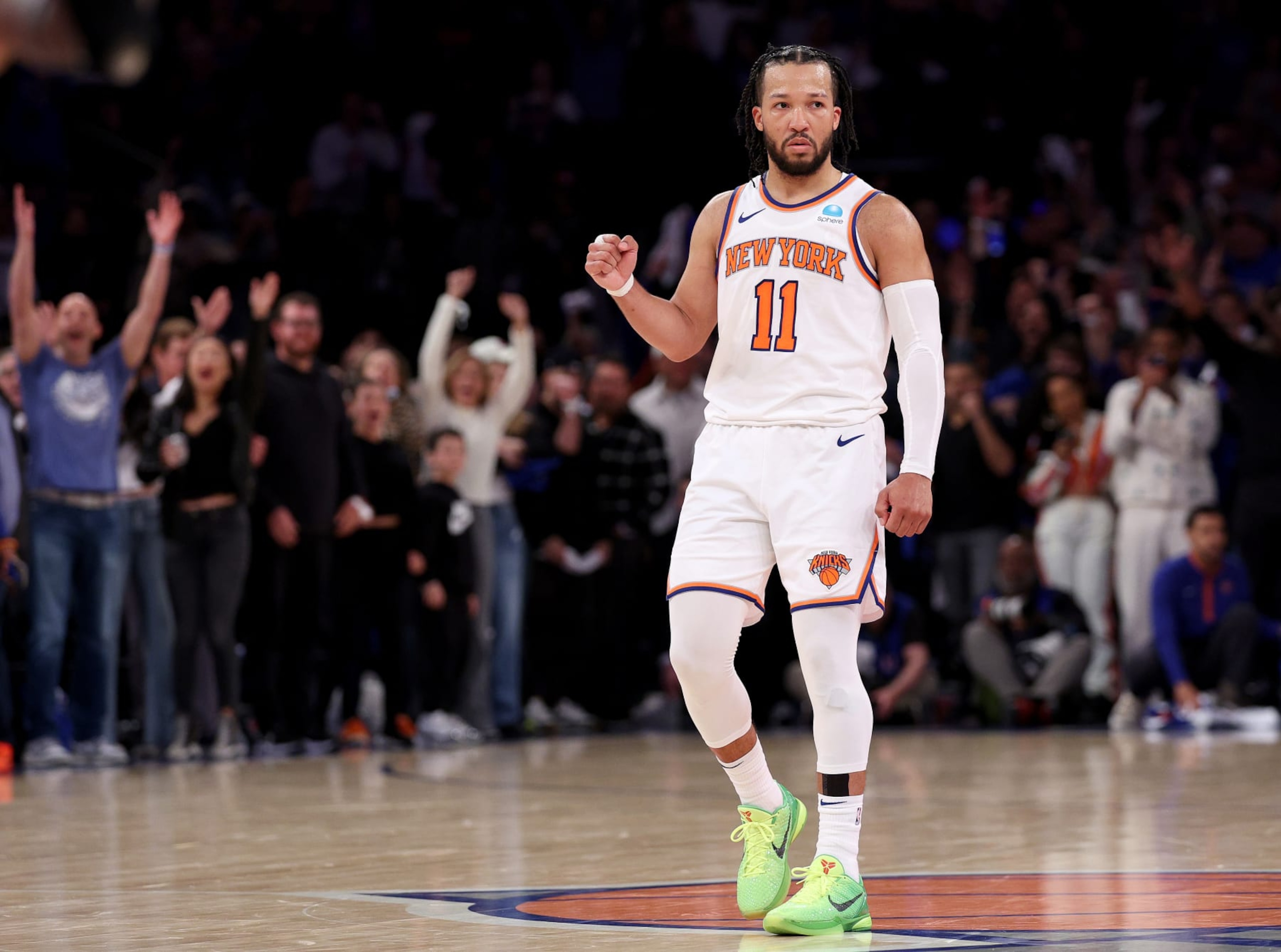 NEW YORK, NEW YORK - APRIL 20: Jalen Brunson #11 of the New York Knicks celebrates late in the fourth quarter against the Philadelphia 76ers in game one of the Eastern Conference First Round Playoffs at Madison Square Garden on April 20, 2024 in New York City. The New York Knicks defeated the Philadelphia 76ers 111-104. NOTE TO USER: User expressly acknowledges and agrees that, by downloading and or using this photograph, User is consenting to the terms and conditions of the Getty Images License Agreement. (Photo by Elsa/Getty Images)