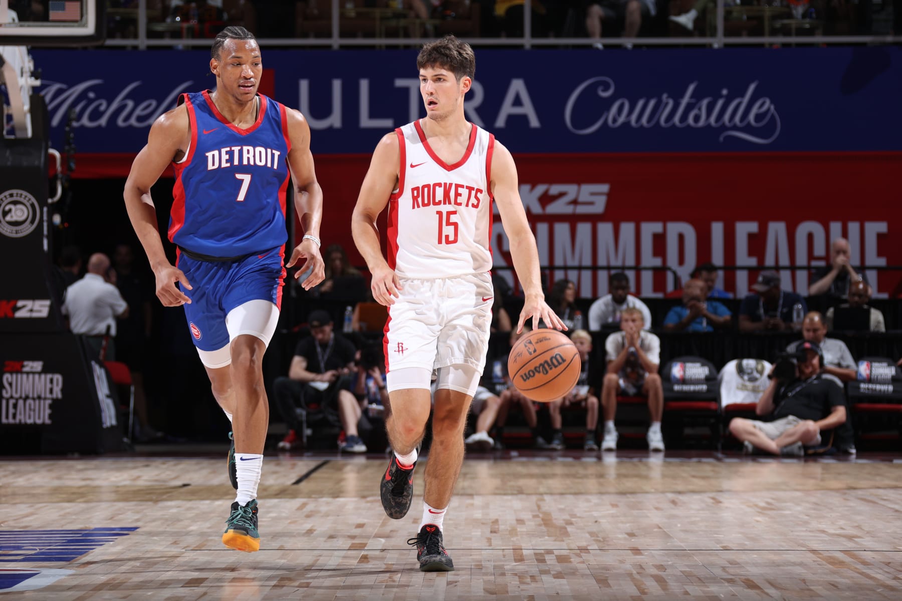 LAS VEGAS, NV - JULY 15: Reed Sheppard #15 of the Houston Rockets dribbles the ball during the game against the Detroit Pistons on July 15, 2024 at the Thomas & Mack Center in Las Vegas, Nevada. NOTE TO USER: User expressly acknowledges and agrees that, by downloading and or using this photograph, User is consenting to the terms and conditions of the Getty Images License Agreement. Mandatory Copyright Notice: Copyright 2024 NBAE (Photo by Stephen Gosling/NBAE via Getty Images)