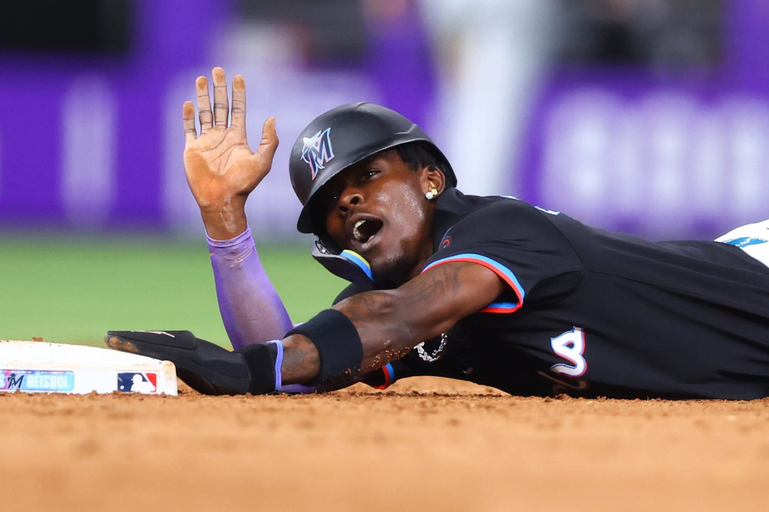MIAMI, FLORIDA - JULY 05: Jazz Chisholm Jr. #2 of the Miami Marlins reacts at second base during the sixth inning of the game against the Chicago White Sox at loanDepot park on July 05, 2024 in Miami, Florida. (Photo by Megan Briggs/Getty Images)