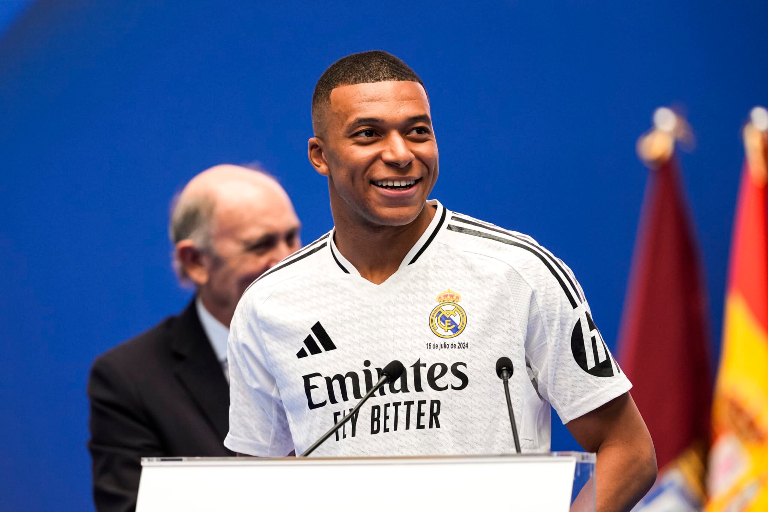 MADRID, SPAIN - JULY 16: Kylian Mbappe poses for photos with Real Madrid jersey during his presentation at Estadio Santiago Bernabeu on July 16, 2024 in Madrid, Spain. (Photo by Alberto Gardin/Eurasia Sport Images/Getty Images) MADRID, SPAIN - JULY 16: Kylian Mbappe poses for photos with Real Madrid jersey during his presentation at Estadio Santiago Bernabeu on July 16, 2024 in Madrid, Spain. (Photo by Alberto Gardin/Eurasia Sport Images/Getty Images)