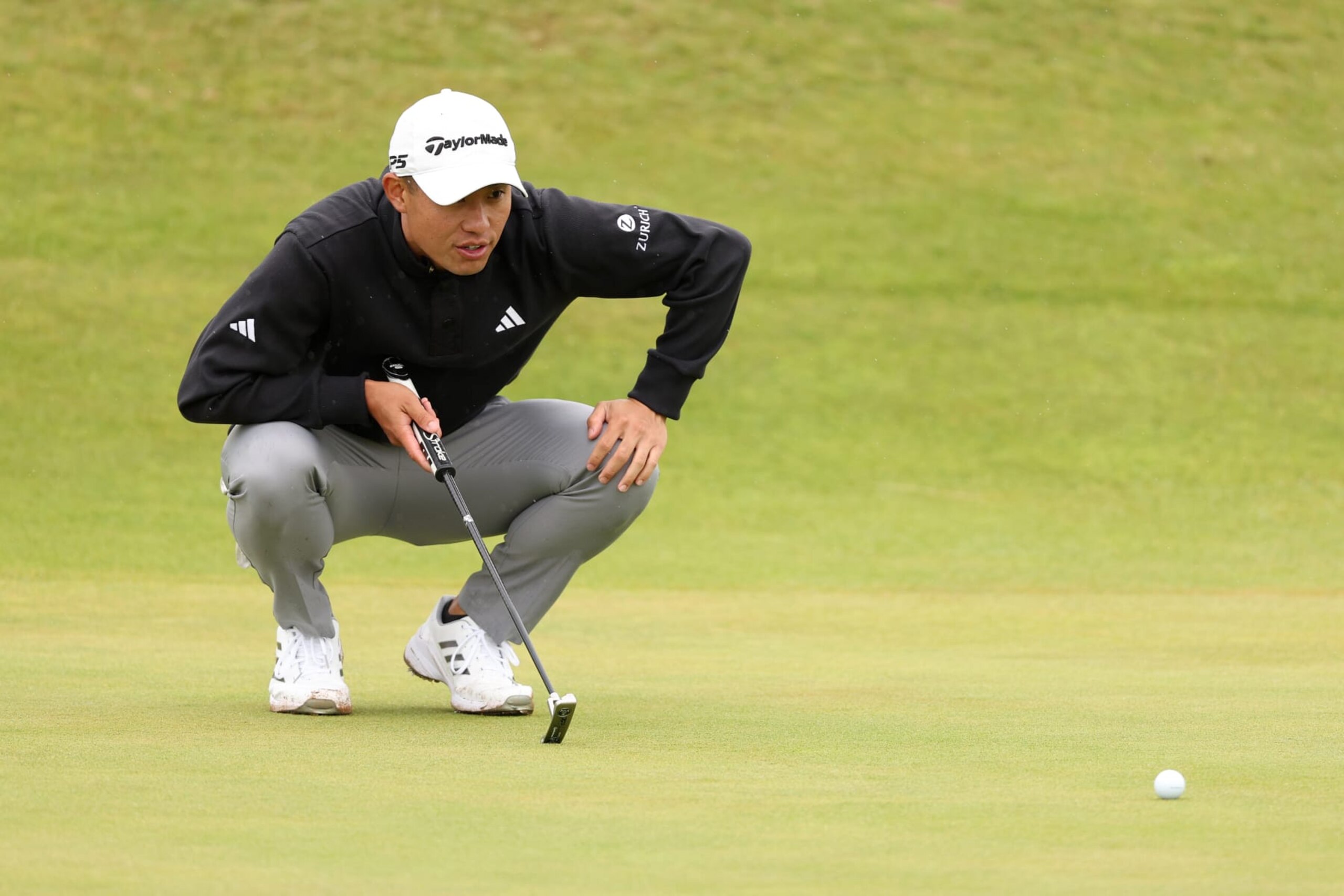 TROON, SCOTLAND - JULY 16: Collin Morikawa of the United States lines up a putt on the 14th green during a practice round prior to The 152nd Open championship at Royal Troon on July 16, 2024 in Troon, Scotland. (Photo by Kevin C. Cox/Getty Images)