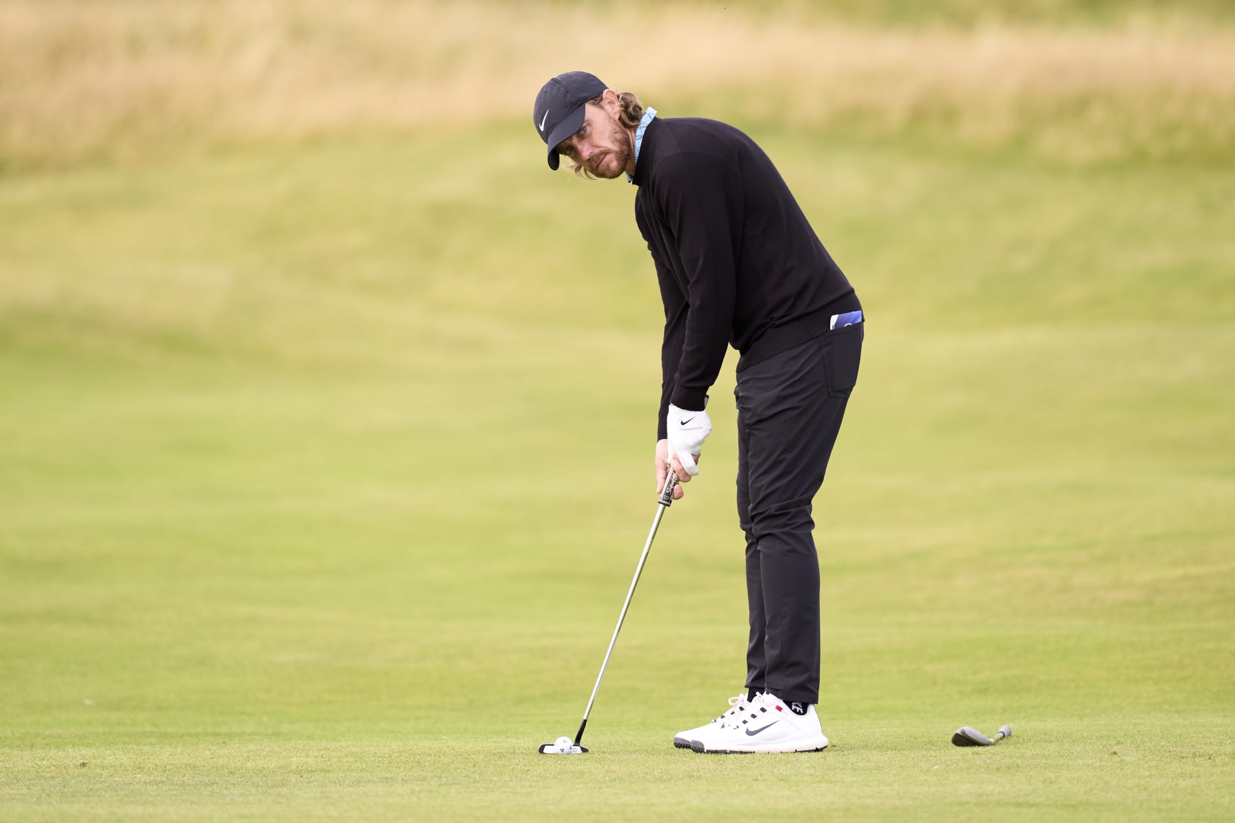 TROON, SCOTLAND - JULY 15: Tommy Fleetwood of England putts during a practice round prior to The 152nd Open championship at Royal Troon on July 15, 2024 in Troon, Scotland. (Photo by Pedro Salado/Getty Images)
