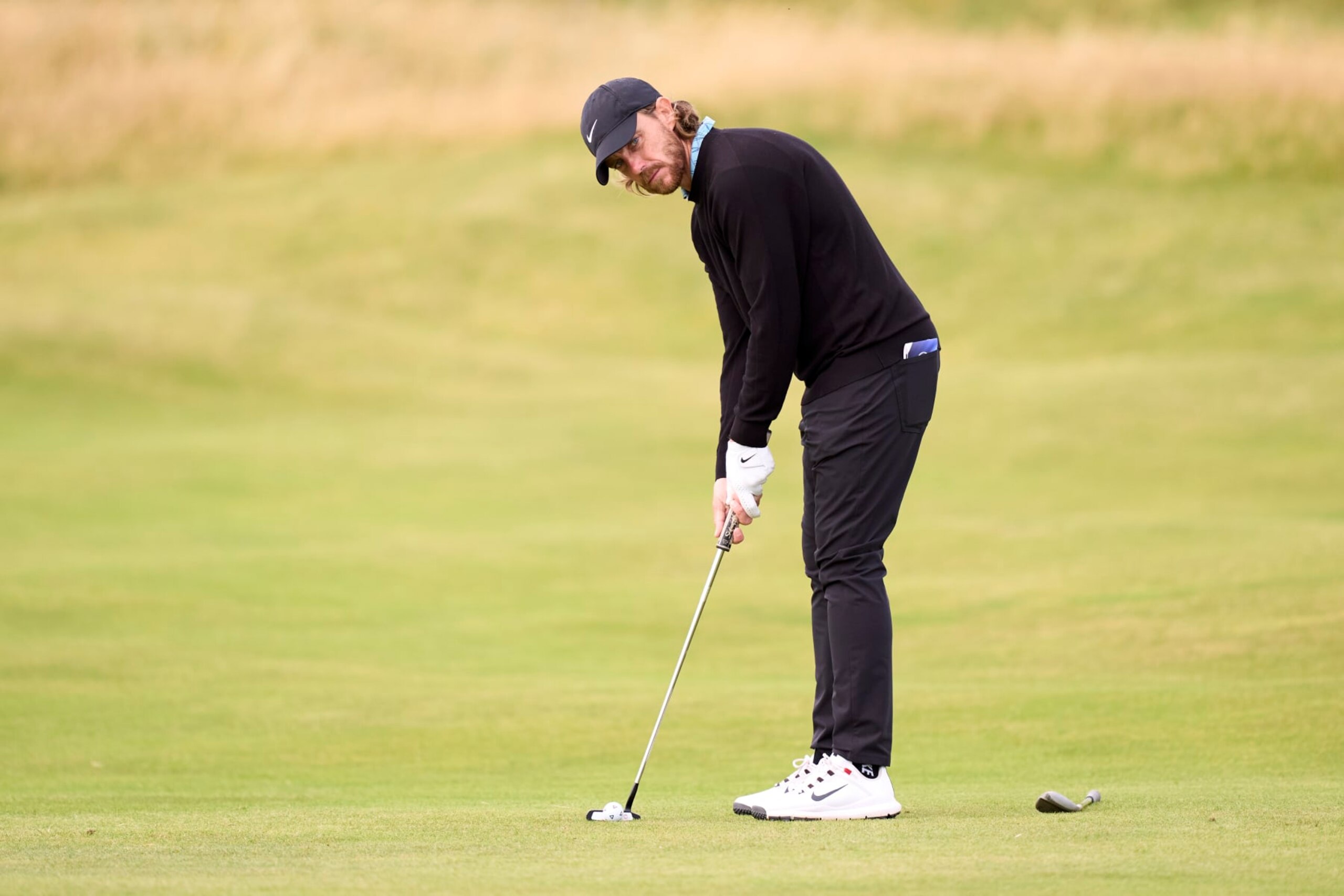 TROON, SCOTLAND - JULY 15: Tommy Fleetwood of England putts during a practice round prior to The 152nd Open championship at Royal Troon on July 15, 2024 in Troon, Scotland. (Photo by Pedro Salado/Getty Images)