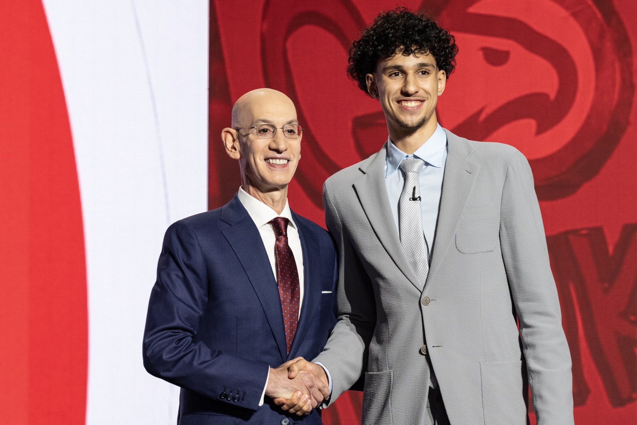 NBA Commissioner Adam Silver and Zaccharie Risacher