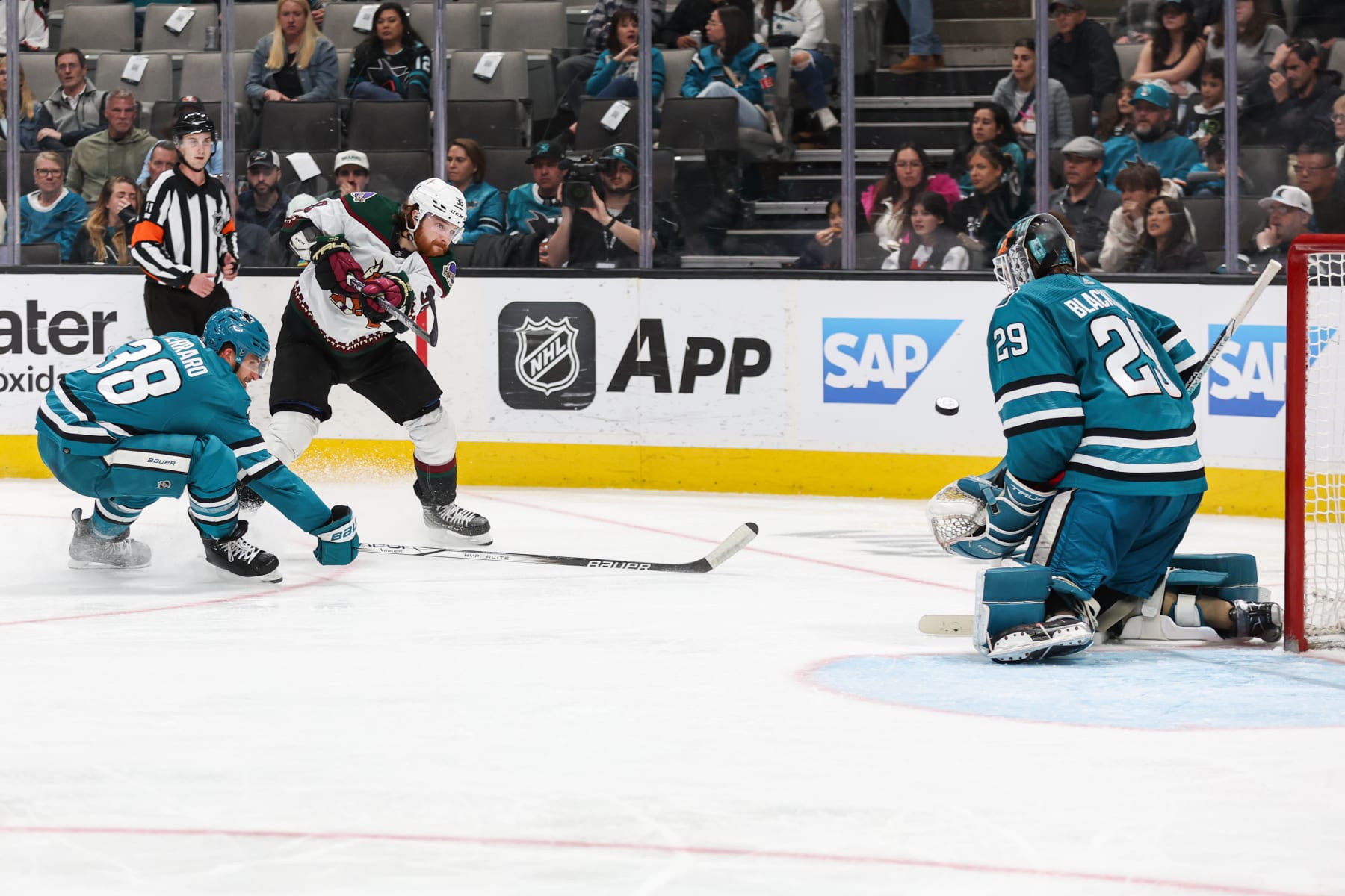 SAN JOSE, CA - APRIL 7: Liam O'Brien #38 of the Arizona Coyotes sends the puck flying towards the net during the third period of a game against the San Jose Sharks at SAP Center on April 7, 2024 in San Jose, California. (Photo by Panayiota Good/NHLI via Getty Images)