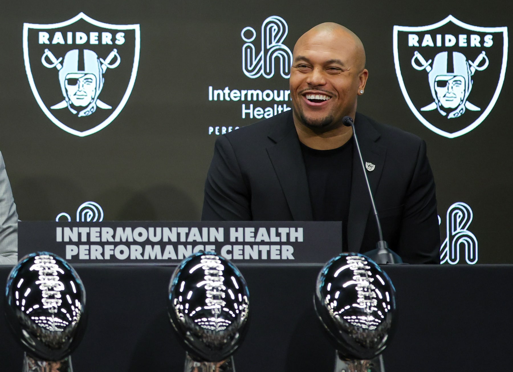 HENDERSON, NEVADA - JANUARY 24: Antonio Pierce laughs as he is introduced as the head coach of the Las Vegas Raiders during a news conference also introducing Tom Telesco as the team's general manager at the Las Vegas Raiders Headquarters/Intermountain Healthcare Performance Center on January 24, 2024 in Henderson, Nevada. (Photo by Ethan Miller/Getty Images)