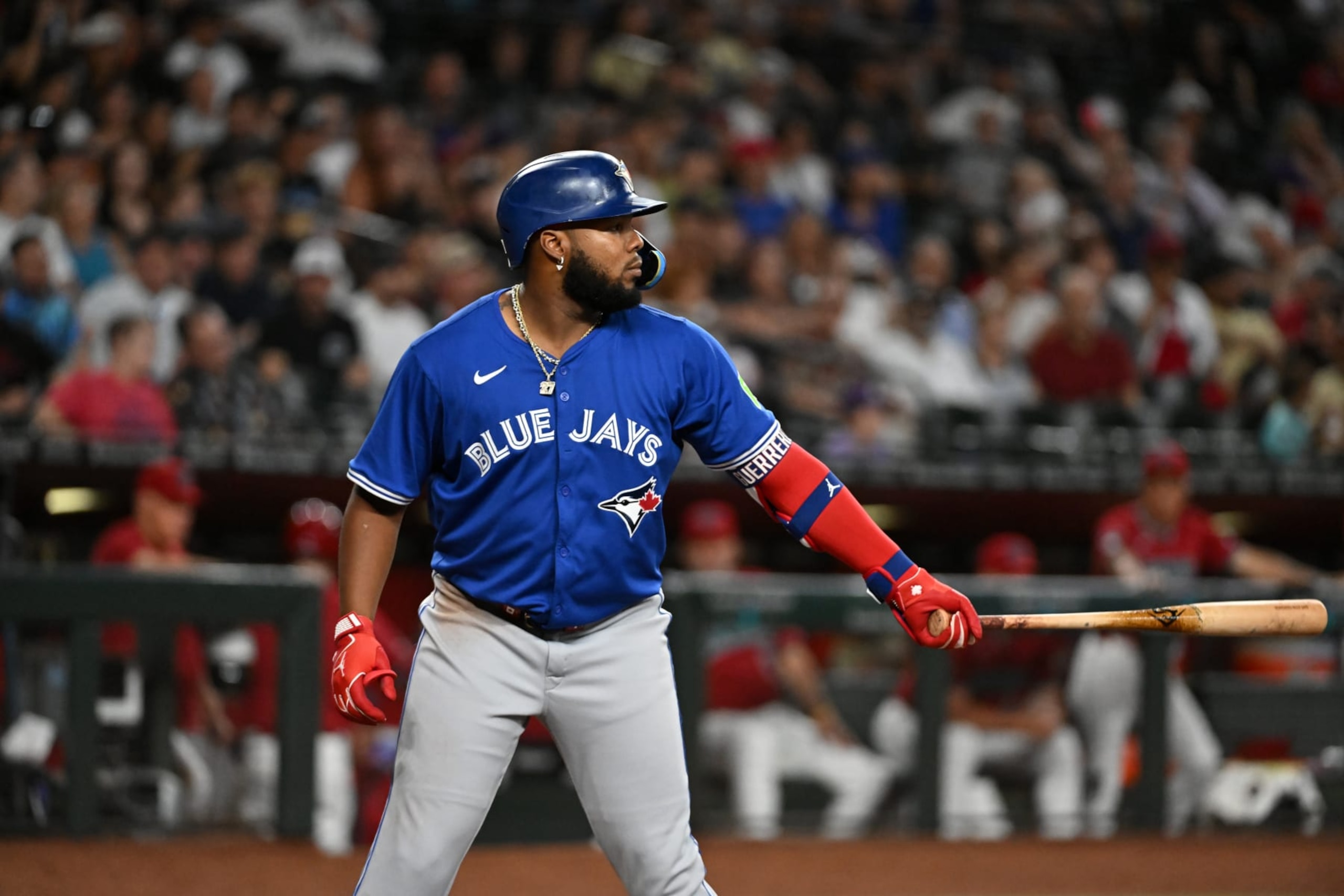 PHOENIX, ARIZONA - JULY 14: Vladimir Guerrero Jr #27 of the Toronto Blue Jays gets ready in the batters box against the Arizona Diamondbacks at Chase Field on July 14, 2024 in Phoenix, Arizona. (Photo by Norm Hall/Getty Images) PHOENIX, ARIZONA - JULY 14: Vladimir Guerrero Jr #27 of the Toronto Blue Jays gets ready in the batters box against the Arizona Diamondbacks at Chase Field on July 14, 2024 in Phoenix, Arizona. (Photo by Norm Hall/Getty Images)