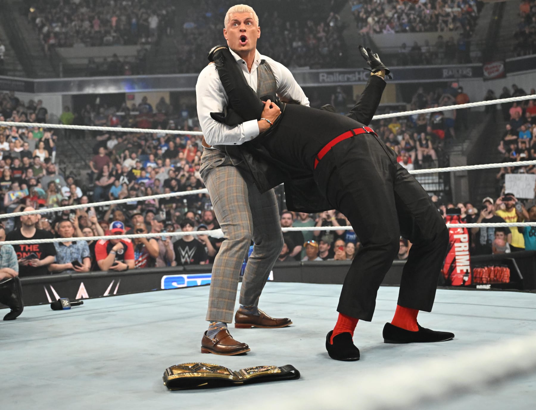 WORCESTER, MASSACHUSETTS - JULY 12: Cody Rhodes tries to silence Sola Sikoa during SmackDown at DCU Center on July 12, 2024 in Worcester, United States.  (Photo by WWE/Getty Images)