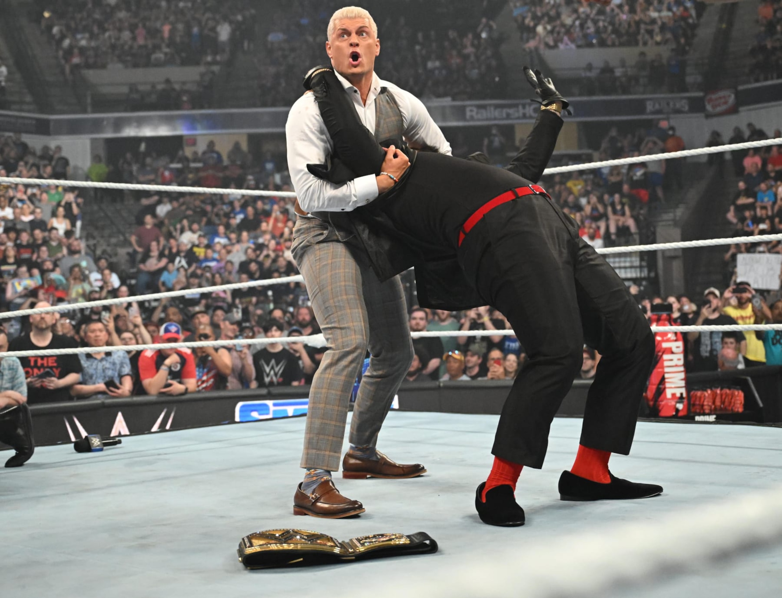 WORCESTER, MASSACHUSETTS - JULY 12: Cody Rhodes tries to silence Sola Sikoa during SmackDown at DCU Center on July 12, 2024 in Worcester, United States.  (Photo by WWE/Getty Images)