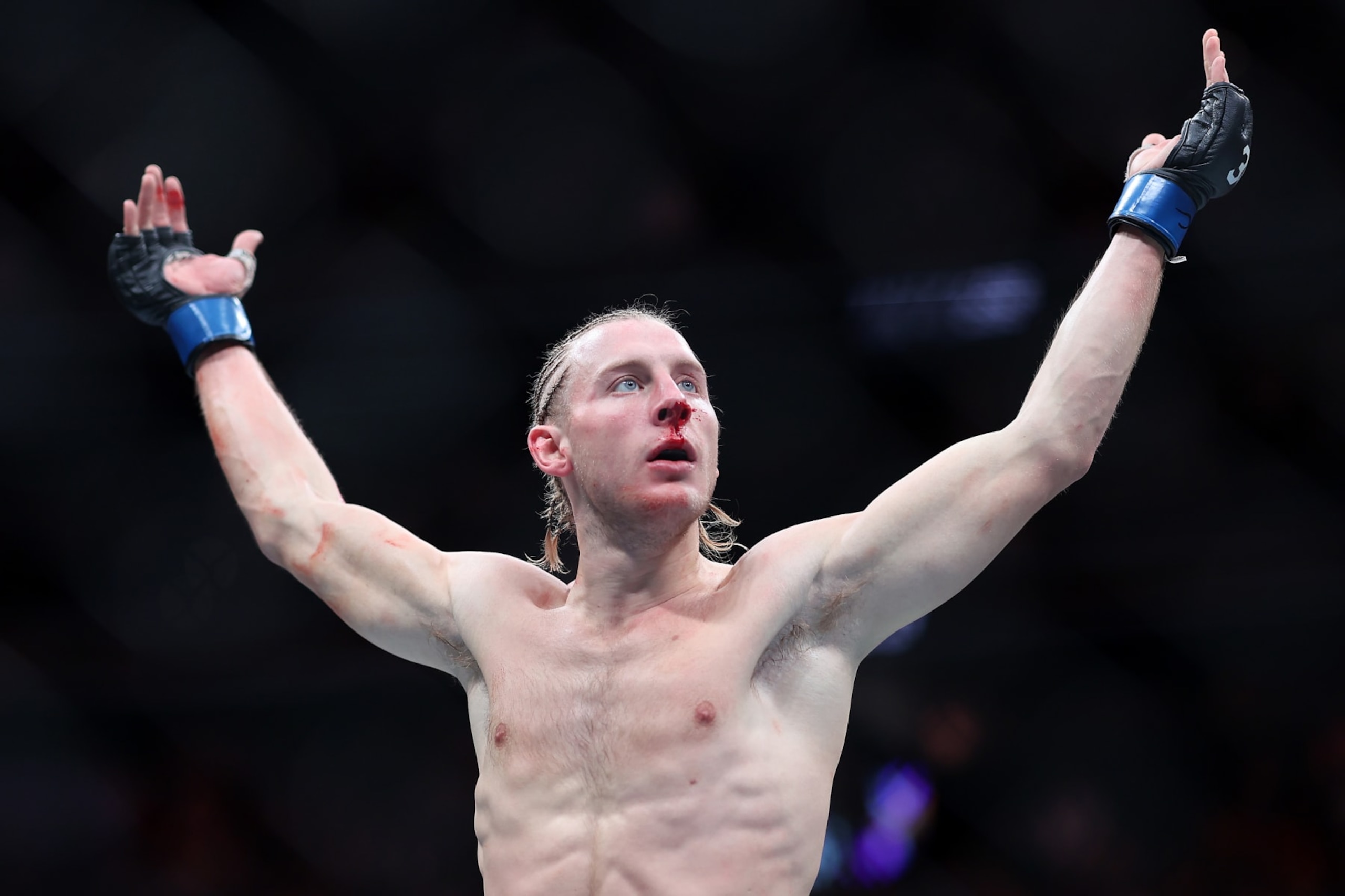 LAS VEGAS, NEVADA - DECEMBER 16: Paddy Pimblett of Great Britain waves to the audience during a lightweight fight against Tony Ferguson of the United States during the UFC 296: Edwards vs. Covington event at T-Mobile Arena on December 16, 2023 in Las Vegas, Nevada. (Photo by Sean M. Haffey/Getty Images) LAS VEGAS, NEVADA - DECEMBER 16: Paddy Pimblett of Great Britain waves to the audience during a lightweight fight against Tony Ferguson of the United States during the UFC 296: Edwards vs. Covington event at T-Mobile Arena on December 16, 2023 in Las Vegas, Nevada. (Photo by Sean M. Haffey/Getty Images)