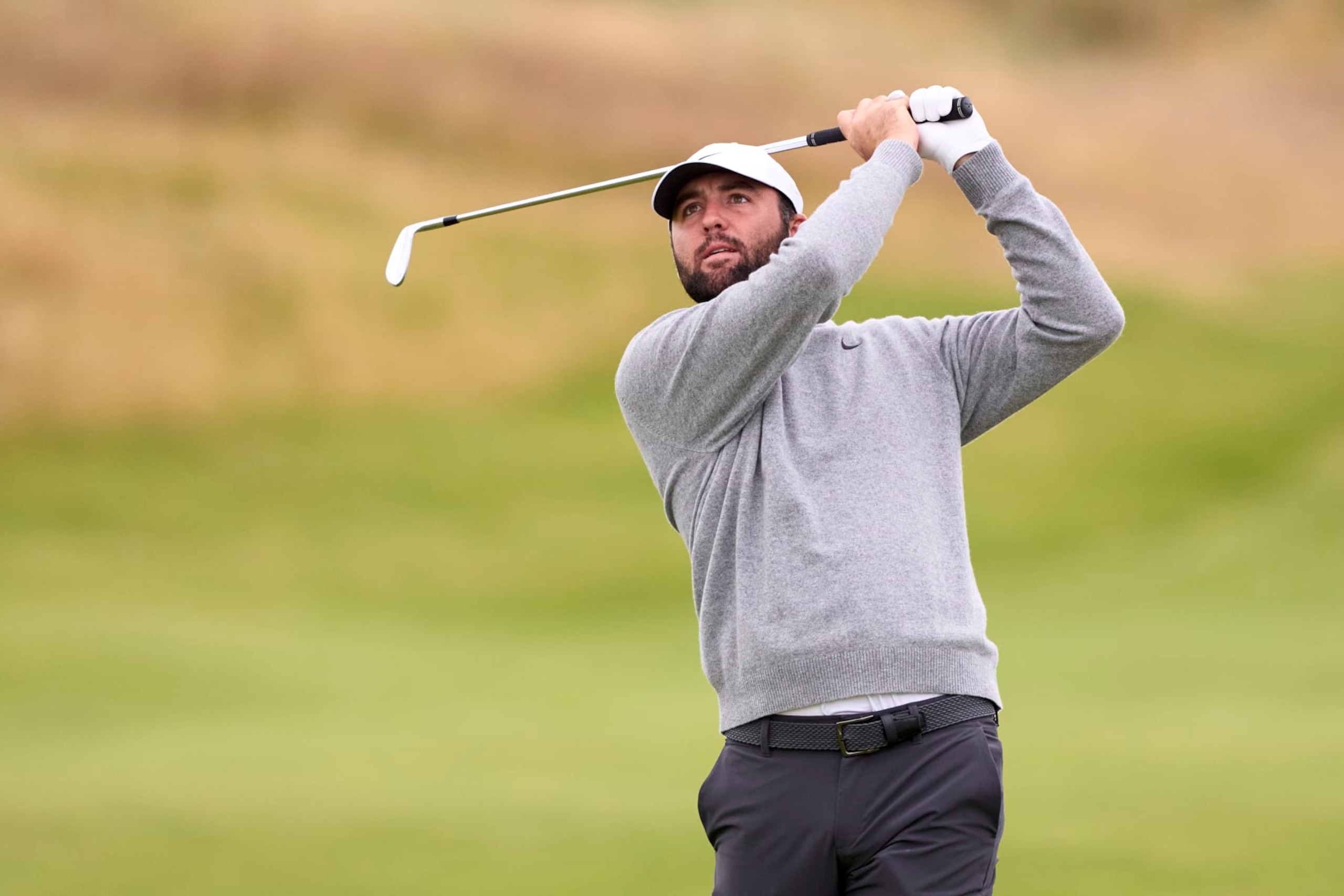 TROON, SCOTLAND - JULY 17: Scottie Scheffler of United States in action during a practice round prior to The 152nd Open championship at Royal Troon on July 17, 2024 in Troon, Scotland. (Photo by Pedro Salado/Getty Images) TROON, SCOTLAND - JULY 17: Scottie Scheffler of United States in action during a practice round prior to The 152nd Open championship at Royal Troon on July 17, 2024 in Troon, Scotland. (Photo by Pedro Salado/Getty Images)