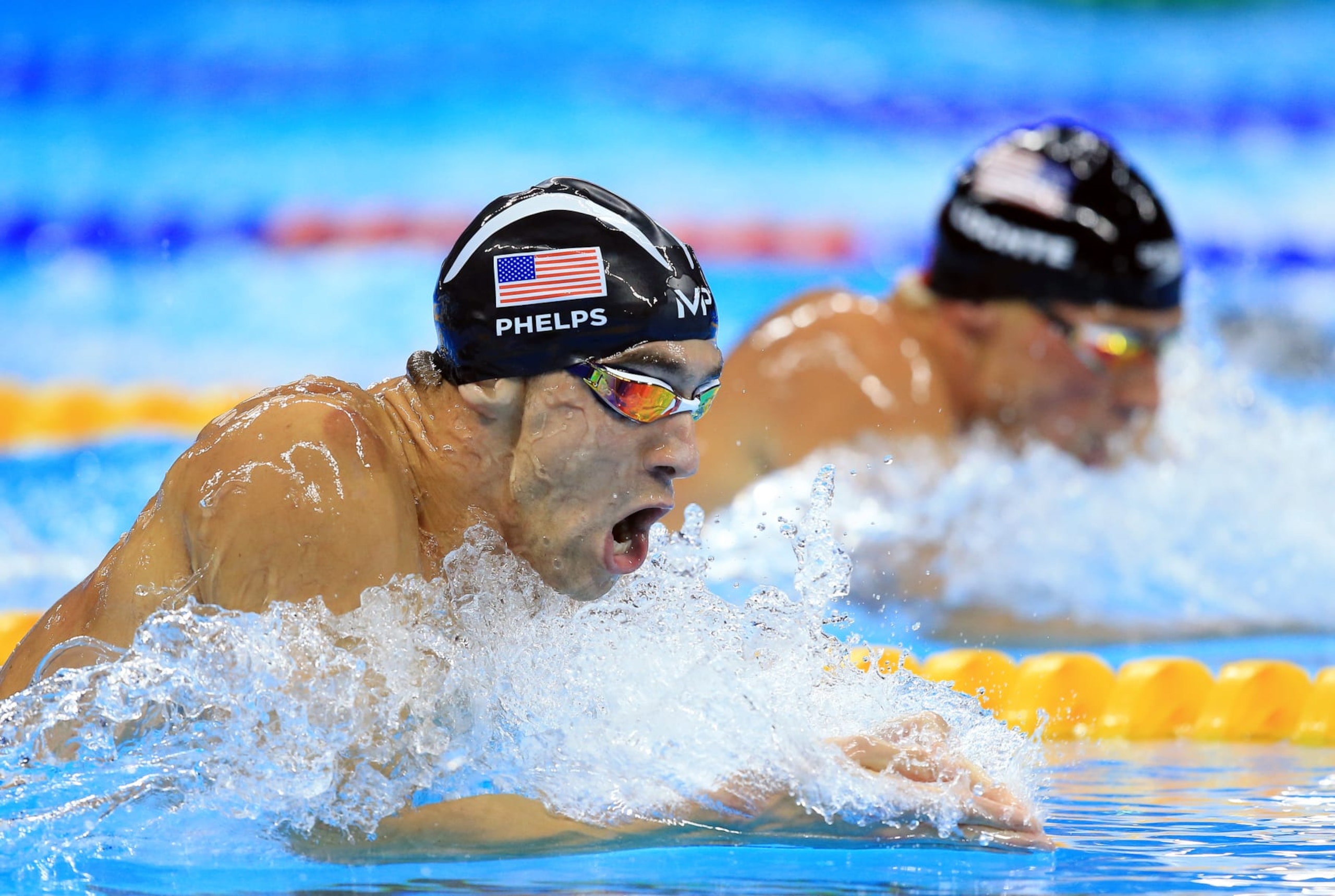 RIO DE JANEIRO, BRAZIL - AUGUST 11: Michael Phelps (L) of the USA wins Gold as teammate Ryan Lochte (R) fails to medal in the Men's 200m Individual Medley Final on Day 6 of the Rio 2016 Olympic Games at the Olympic Aquatics Stadium on August 11, 2016 in Rio de Janerio, Brazil. (Photo by Vaughn Ridley/Getty Images) RIO DE JANEIRO, BRAZIL - AUGUST 11: Michael Phelps (L) of the USA wins Gold as teammate Ryan Lochte (R) fails to medal in the Men's 200m Individual Medley Final on Day 6 of the Rio 2016 Olympic Games at the Olympic Aquatics Stadium on August 11, 2016 in Rio de Janerio, Brazil. (Photo by Vaughn Ridley/Getty Images)