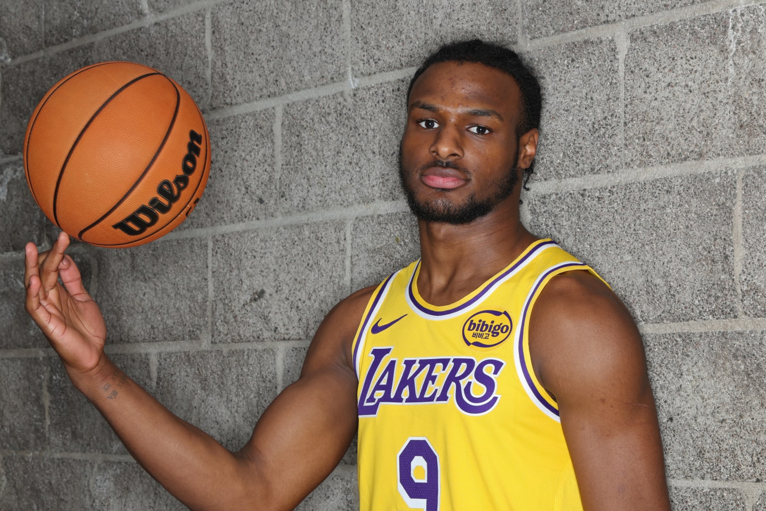 LAS VEGAS, NV - JULY16: Bronny James #9 of the Los Angeles Lakers poses for a portrait during the 2024 NBA Rookie Photo Shoot on July 16, 2024 at the University of Nevada, Las Vegas campus in Las Vegas, Nevada. NOTE TO USER: User expressly acknowledges and agrees that, by downloading and/or using this Photograph, user is consenting to the terms and conditions of the Getty Images License Agreement. Mandatory Copyright Notice: Copyright 2024 NBAE (Photo by David Sherman/NBAE via Getty Images)
