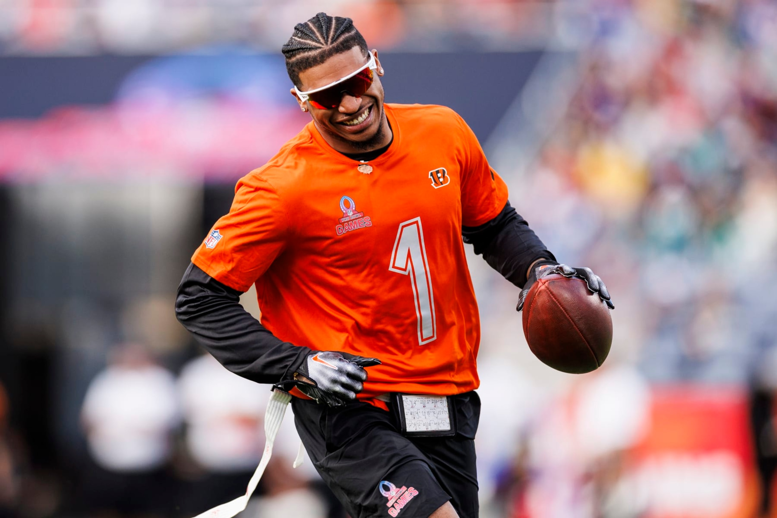 ORLANDO, FLORIDA - FEBRUARY 04:  Ja’Marr Chase #1 of the Cincinnati Bengals and AFC reacts during the 2024 NFL Pro Bowl at Camping World Stadium on February 04, 2024 in Orlando, Florida. (Photo by James Gilbert/Getty Images)