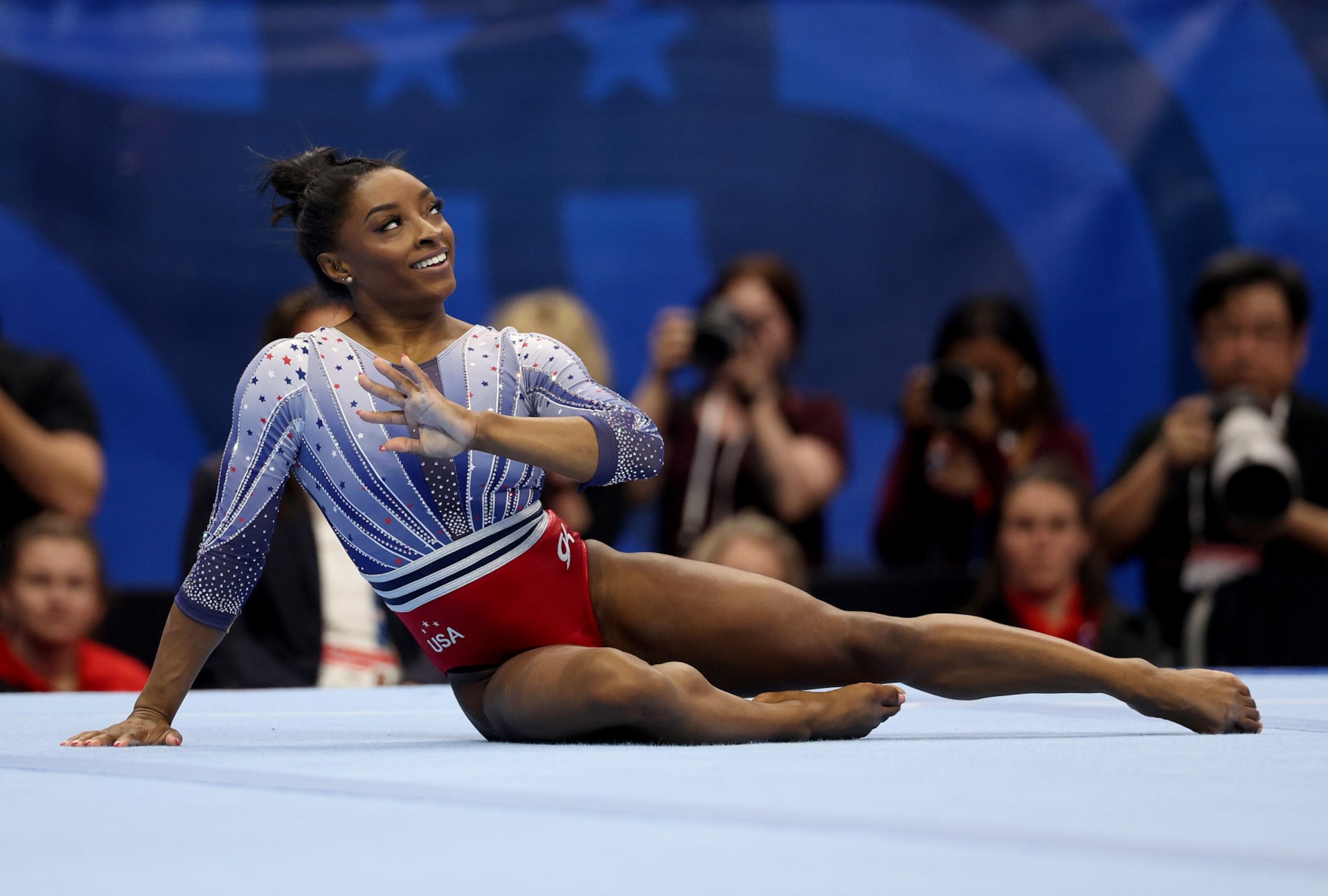 MINNEAPOLIS, MINNESOTA - JUNE 28: Simone Biles competes in the floor exercise on Day Two of the 2024 U.S. Olympic Team Gymnastics Trials at Target Center on June 28, 2024 in Minneapolis, Minnesota. (Photo by Elsa/Getty Images) MINNEAPOLIS, MINNESOTA - JUNE 28: Simone Biles competes in the floor exercise on Day Two of the 2024 U.S. Olympic Team Gymnastics Trials at Target Center on June 28, 2024 in Minneapolis, Minnesota. (Photo by Elsa/Getty Images)