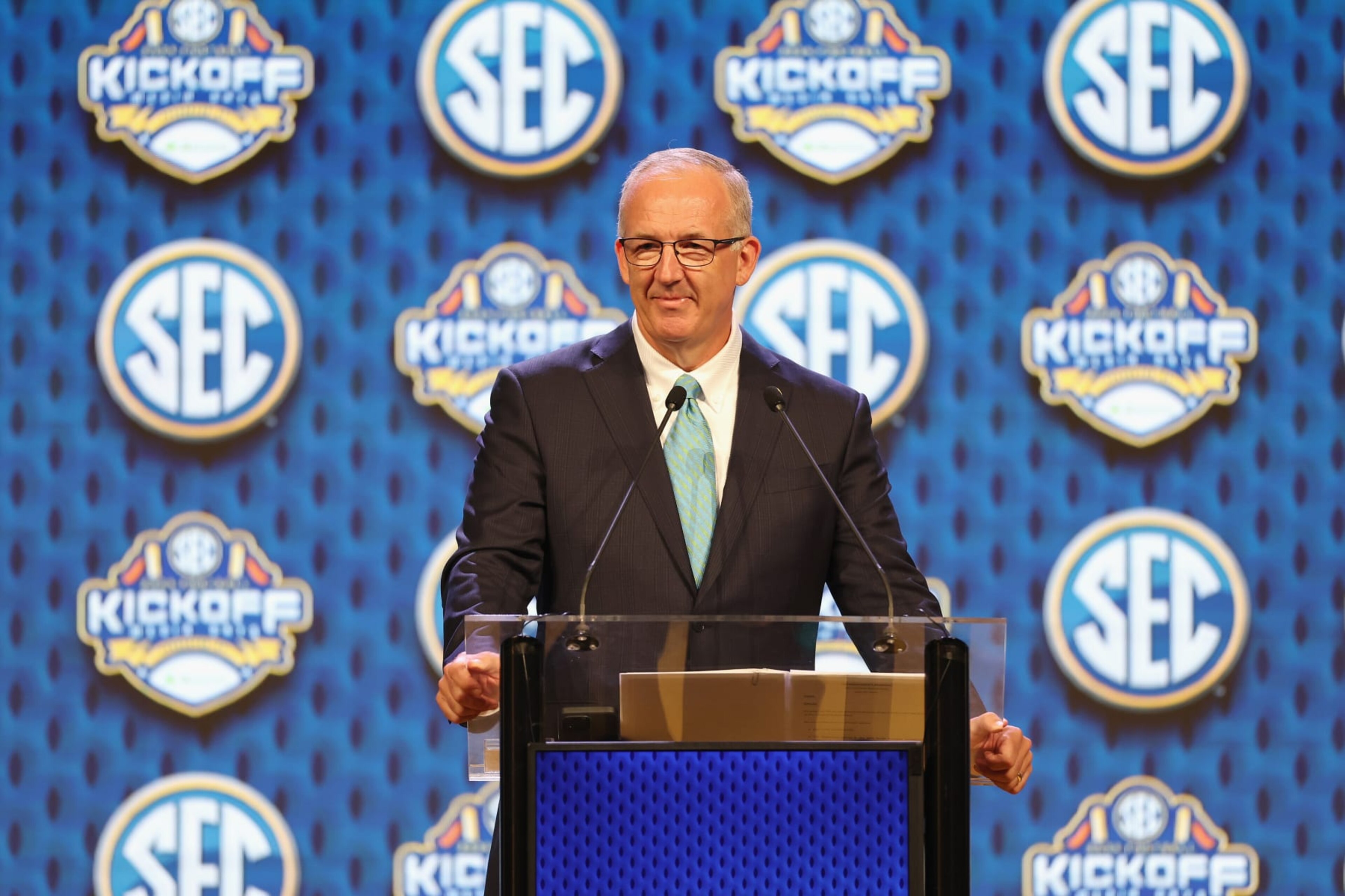 DALLAS, TEXAS - JULY 15: SEC Commissioner Greg Sankey speaks during SEC Football Media Days at Omni Dallas Hotel on July 15, 2024 in Dallas, Texas. (Photo by Tim Warner/Getty Images) DALLAS, TEXAS - JULY 15: SEC Commissioner Greg Sankey speaks during SEC Football Media Days at Omni Dallas Hotel on July 15, 2024 in Dallas, Texas. (Photo by Tim Warner/Getty Images)