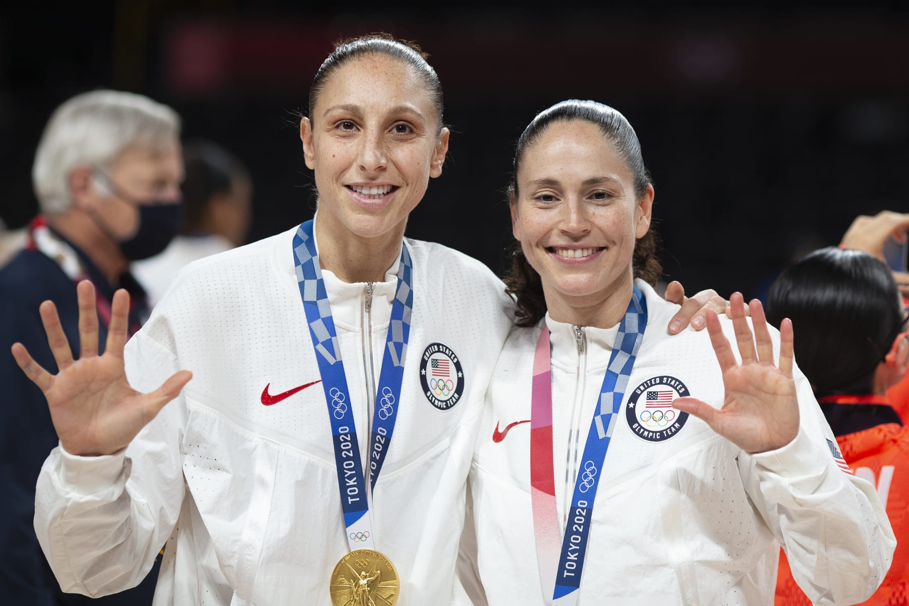 TOKYO, JAPAN August 8:  Five-time Olympic gold medalists Diana Taurasi #12 of the United States and Sue Bird #6 of the United States with their gold medals at the presentation ceremony after the team victory during the Japan V USA basketball final for women at the Saitama Super Arena during the Tokyo 2020 Summer Olympic Games on August 8, 2021 in Tokyo, Japan. (Photo by Tim Clayton/Corbis via Getty Images)