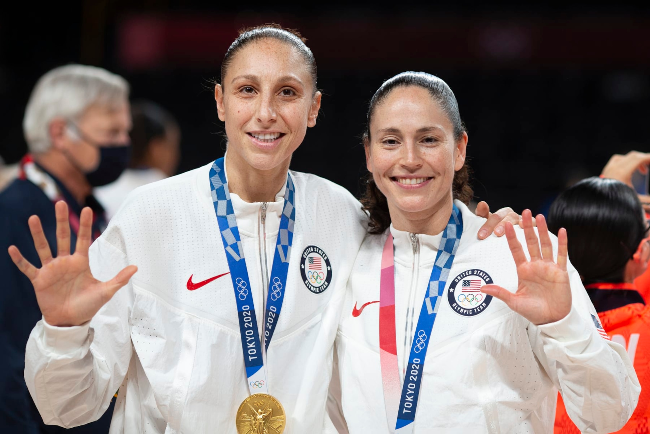 TOKYO, JAPAN August 8: Five-time Olympic gold medalists Diana Taurasi #12 of the United States and Sue Bird #6 of the United States with their gold medals at the presentation ceremony after the team victory during the Japan V USA basketball final for women at the Saitama Super Arena during the Tokyo 2020 Summer Olympic Games on August 8, 2021 in Tokyo, Japan. (Photo by Tim Clayton/Corbis via Getty Images) TOKYO, JAPAN August 8: Five-time Olympic gold medalists Diana Taurasi #12 of the United States and Sue Bird #6 of the United States with their gold medals at the presentation ceremony after the team victory during the Japan V USA basketball final for women at the Saitama Super Arena during the Tokyo 2020 Summer Olympic Games on August 8, 2021 in Tokyo, Japan. (Photo by Tim Clayton/Corbis via Getty Images)