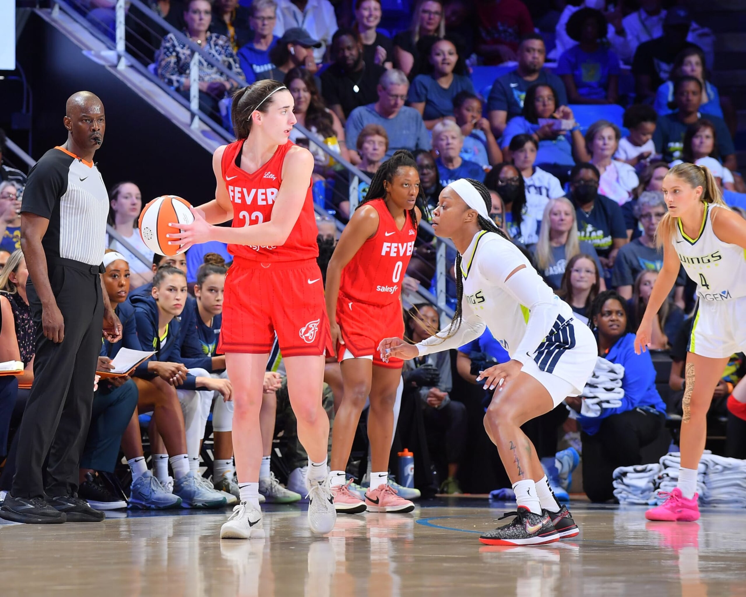 ARLINGTON, TX - JULY 17: Odyssey Sims #2 of the Dallas Wings plays defense during the game  against Caitlin Clark #22 of the Indiana Fever on July 17, 2024 at the College Park Center in Arlington, TX. NOTE TO USER: User expressly acknowledges and agrees that, by downloading and or using this photograph, User is consenting to the terms and conditions of the Getty Images License Agreement. Mandatory Copyright Notice: Copyright 2024 NBAE (Photo by Michael Gonzales/NBAE via Getty Images)