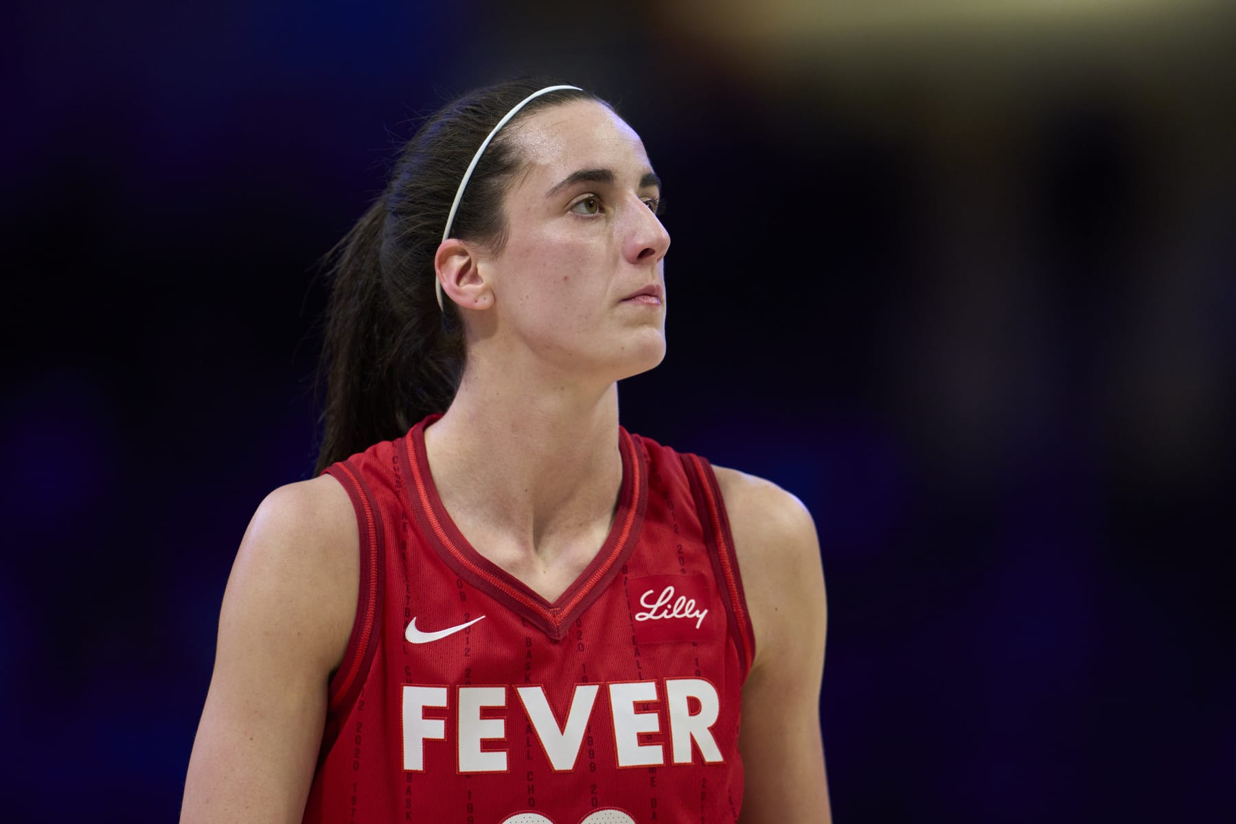 ARLINGTON, TEXAS - JULY 17: Caitlin Clark #22 of the Indiana Fever looks on against the Dallas Wings at the College Park Center on July 17, 2024 in Arlington, Texas. NOTE TO USER: User expressly acknowledges and agrees that, by downloading and or using this photograph, User is consenting to the terms and conditions of the Getty Images License Agreement.  (Photo by Cooper Neill/Getty Images)