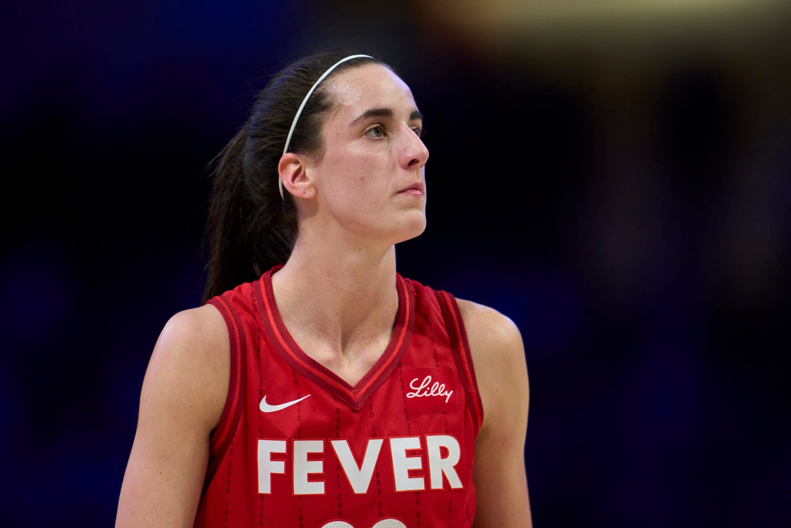 ARLINGTON, TEXAS - JULY 17: Caitlin Clark #22 of the Indiana Fever looks on against the Dallas Wings at the College Park Center on July 17, 2024 in Arlington, Texas. NOTE TO USER: User expressly acknowledges and agrees that, by downloading and or using this photograph, User is consenting to the terms and conditions of the Getty Images License Agreement. (Photo by Cooper Neill/Getty Images) ARLINGTON, TEXAS - JULY 17: Caitlin Clark #22 of the Indiana Fever looks on against the Dallas Wings at the College Park Center on July 17, 2024 in Arlington, Texas. NOTE TO USER: User expressly acknowledges and agrees that, by downloading and or using this photograph, User is consenting to the terms and conditions of the Getty Images License Agreement. (Photo by Cooper Neill/Getty Images)