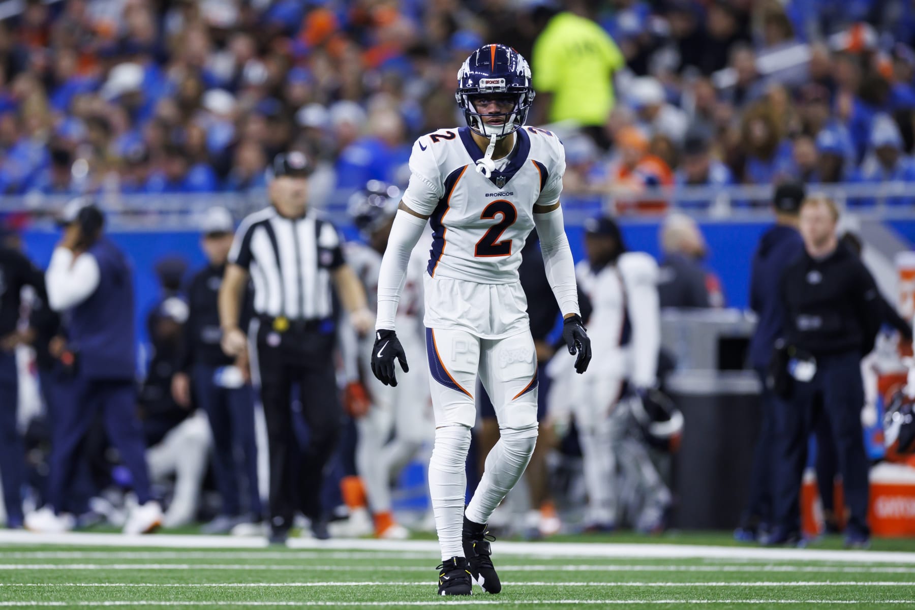DETROIT, MICHIGAN - DECEMBER 16: Pat Surtain II #2 of the Denver Broncos defends in coverage during an NFL football game against the Detroit Lions at Ford Field on December 16, 2023 in Detroit, Michigan. (Photo by Ryan Kang/Getty Images)