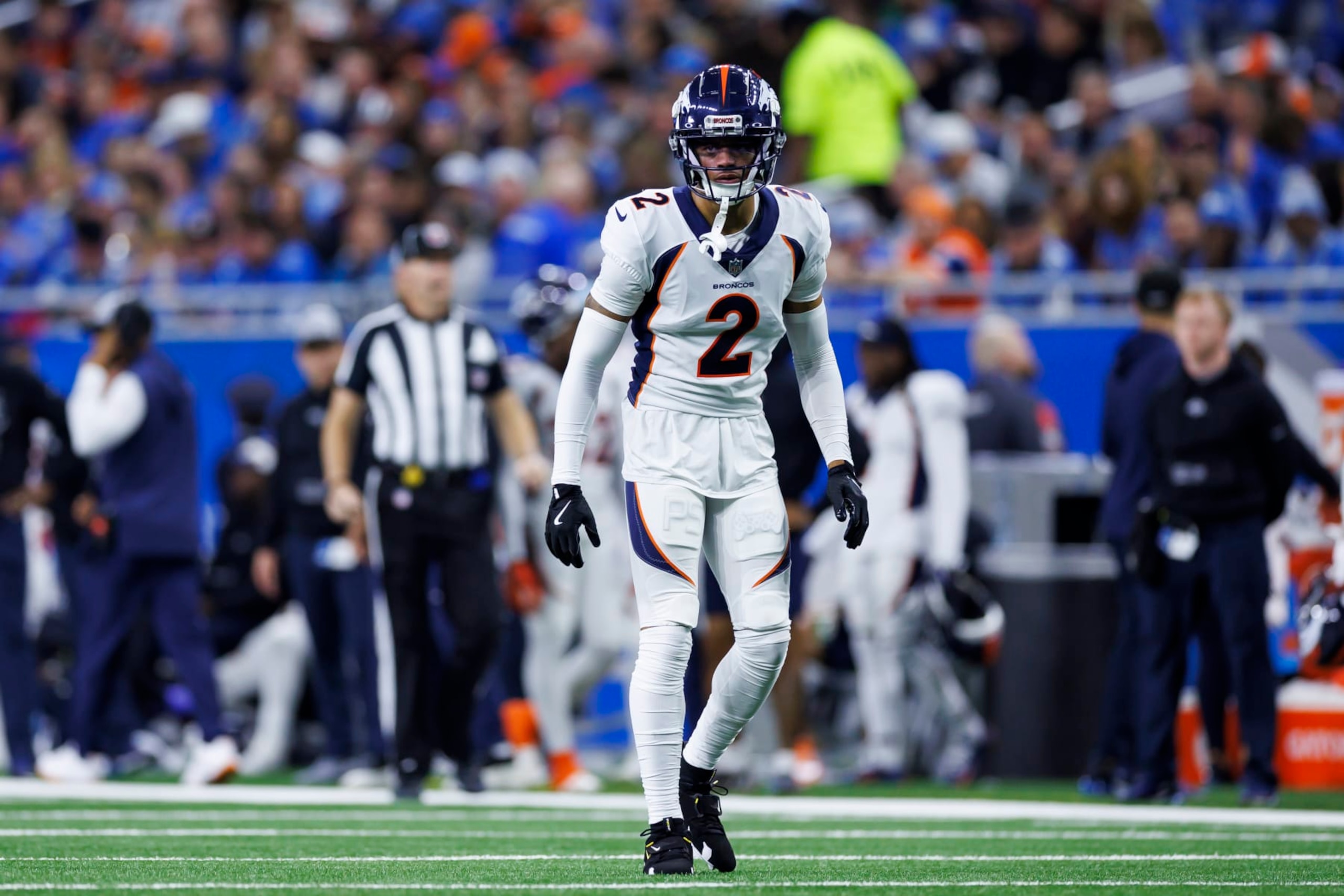 DETROIT, MICHIGAN - DECEMBER 16: Pat Surtain II #2 of the Denver Broncos defends in coverage during an NFL football game against the Detroit Lions at Ford Field on December 16, 2023 in Detroit, Michigan. (Photo by Ryan Kang/Getty Images)