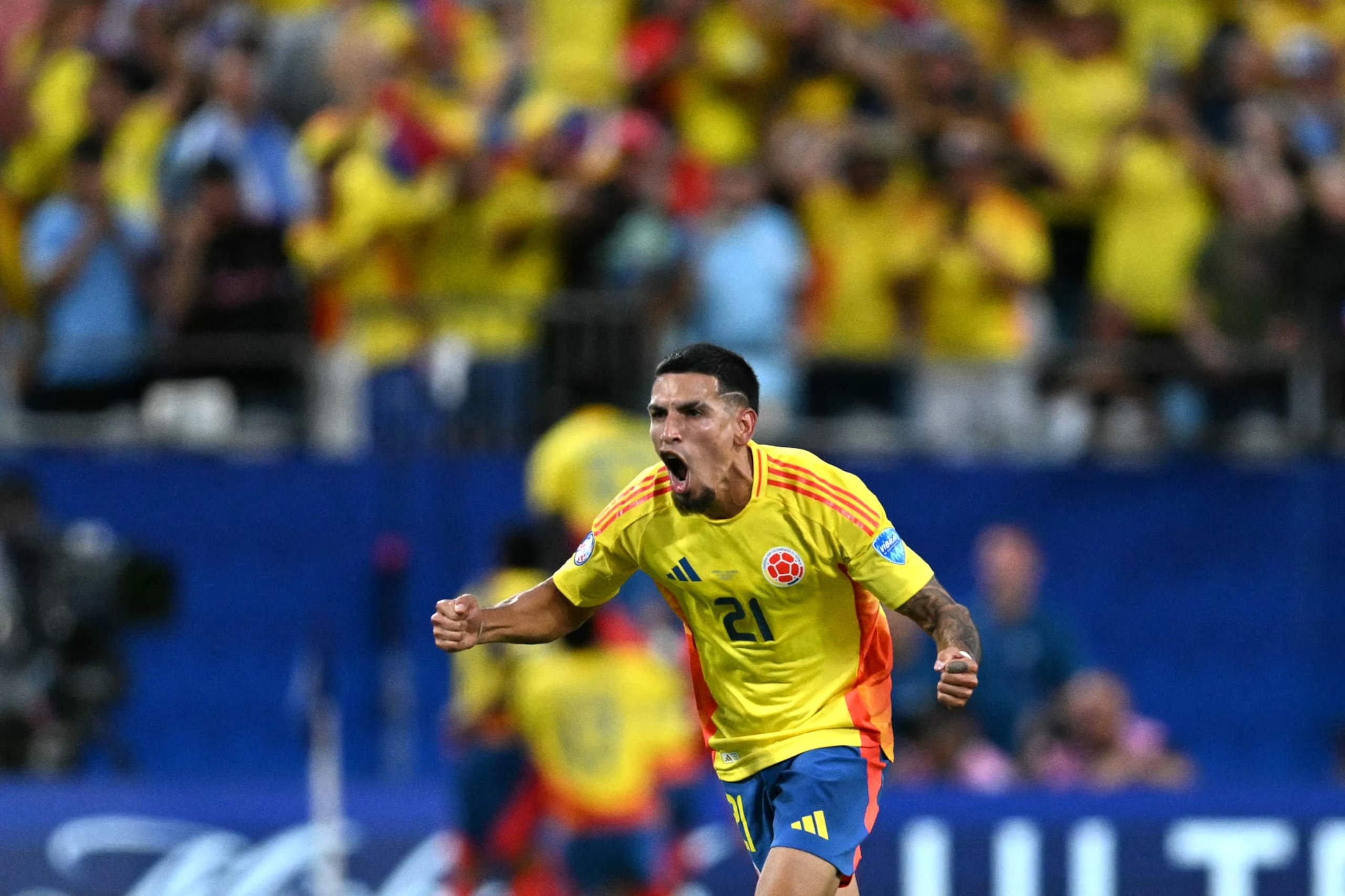 TOPSHOT - Colombia's defender #21 Daniel Munoz celebrates his team's first goal during the Conmebol 2024 Copa America tournament semi-final football match between Uruguay and Colombia at Bank of America Stadium, in Charlotte, North Caroline on July 10, 2024. (Photo by Chandan Khanna / AFP) (Photo by CHANDAN KHANNA/AFP via Getty Images) TOPSHOT - Colombia's defender #21 Daniel Munoz celebrates his team's first goal during the Conmebol 2024 Copa America tournament semi-final football match between Uruguay and Colombia at Bank of America Stadium, in Charlotte, North Caroline on July 10, 2024. (Photo by Chandan Khanna / AFP) (Photo by CHANDAN KHANNA/AFP via Getty Images)