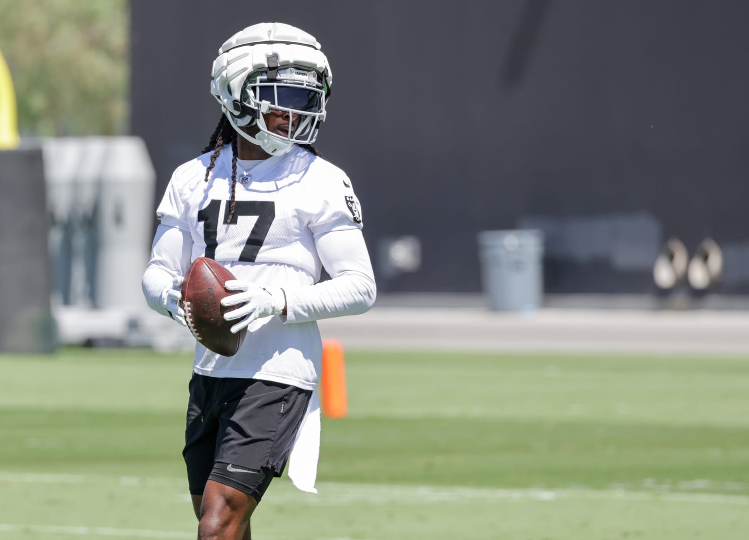 HENDERSON, NEVADA - JUNE 11: Wide receiver Davante Adams #17 of the Las Vegas Raiders runs through a drill during mandatory minicamp at the Las Vegas Raiders Headquarters/Intermountain Healthcare Performance Center on June 11, 2024 in Henderson, Nevada. (Photo by Ethan Miller/Getty Images)