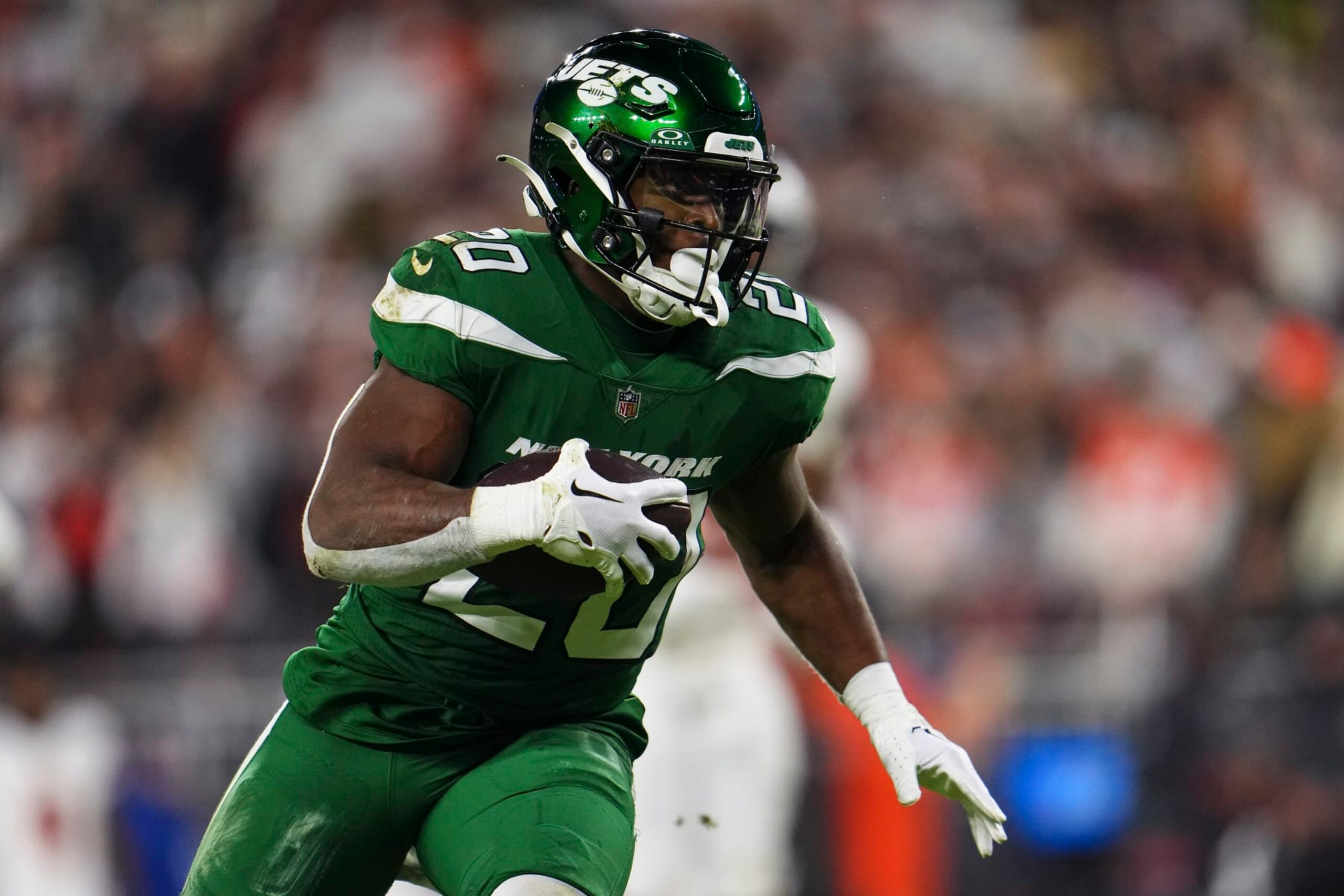CLEVELAND, OH - DECEMBER 28: Breece Hall #20 of the New York Jets runs the ball during an NFL football game against the Cleveland Browns at Cleveland Browns Stadium on December 28, 2023 in Cleveland, Ohio. (Photo by Cooper Neill/Getty Images)