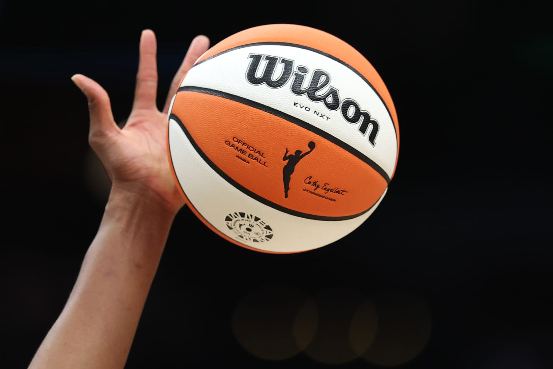 SEATTLE, WASHINGTON - JULY 10: The WNBA logo on the ball is seen as it is tipped during the game between the Seattle Storm and the Las Vegas Aces at Climate Pledge Arena on July 10, 2024 in Seattle, Washington. NOTE TO USER: User expressly acknowledges and agrees that, by downloading and or using this photograph, User is consenting to the terms and conditions of the Getty Images License Agreement. (Photo by Steph Chambers/Getty Images)