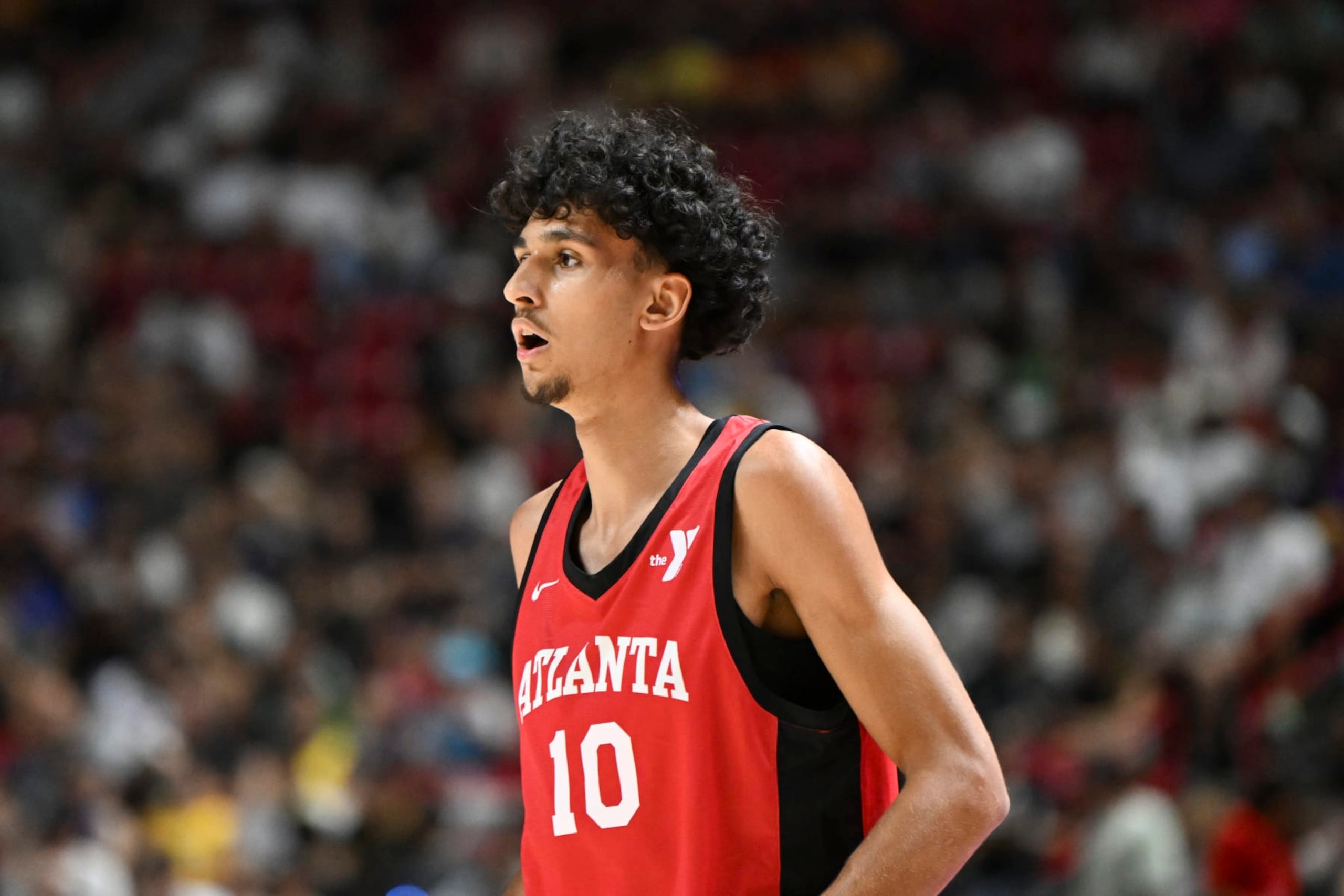 LAS VEGAS, NEVADA - JULY 12: Zaccharie Risacher #10 of the Atlanta Hawks looks on against the Washington Wizards in the first half of a 2024 NBA Summer League game at the Thomas & Mack Center on July 12, 2024 in Las Vegas, Nevada. NOTE TO USER: User expressly acknowledges and agrees that, by downloading and or using this photograph, User is consenting to the terms and conditions of the Getty Images License Agreement. (Photo by Candice Ward/Getty Images)