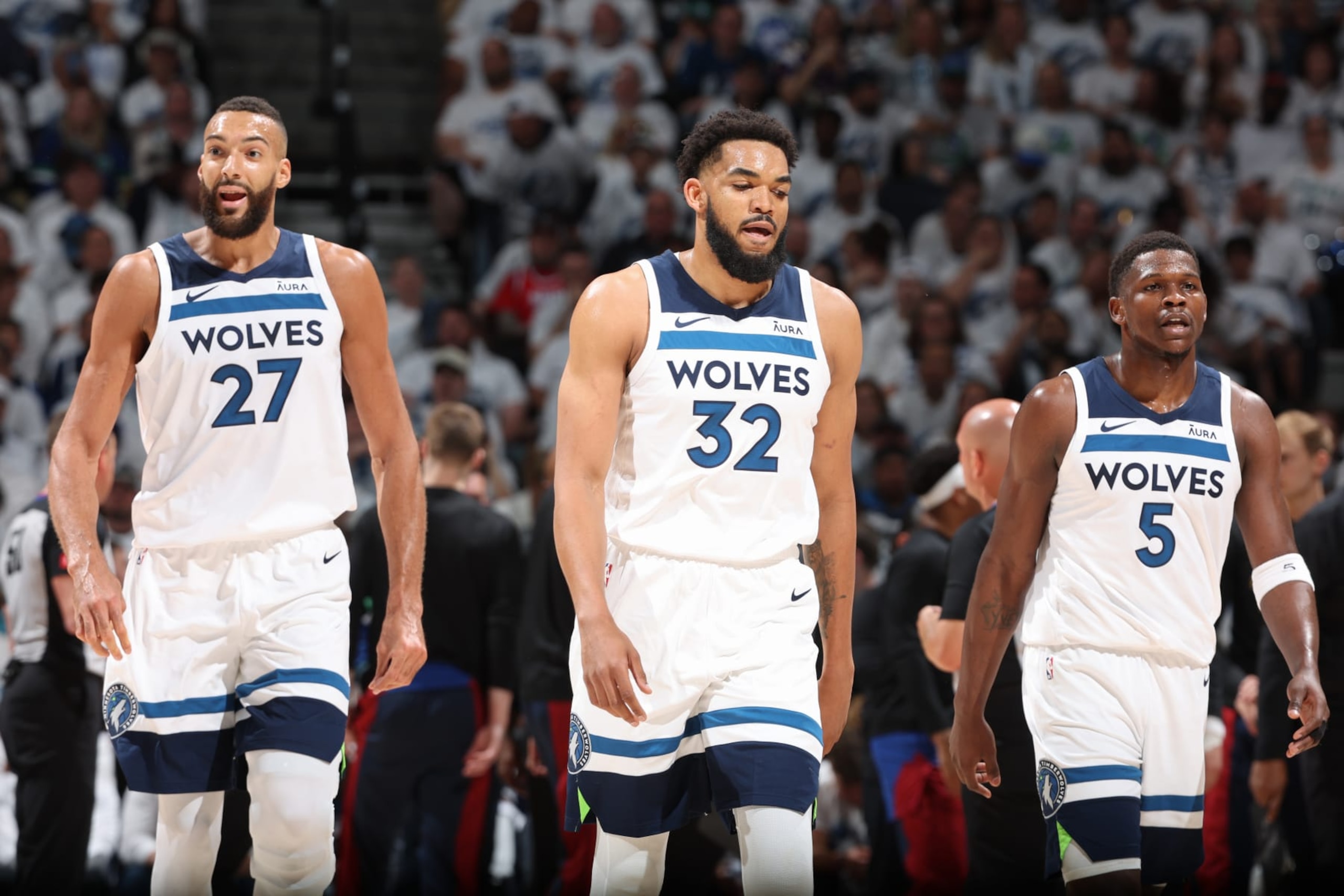 MINNEAPOLIS, MN - MAY 10: Rudy Gobert #27, Karl-Anthony Towns #32 and Anthony Edwards #5 of the Minnesota Timberwolves looks on during the game against the Denver Nuggets during Round 2 Game 3 of the 2024 NBA Playoffs on May 10, 2024 at Target Center in Minneapolis, Minnesota. NOTE TO USER: User expressly acknowledges and agrees that, by downloading and or using this Photograph, user is consenting to the terms and conditions of the Getty Images License Agreement. Mandatory Copyright Notice: Copyright 2024 NBAE (Photo by David Sherman/NBAE via Getty Images) MINNEAPOLIS, MN - MAY 10: Rudy Gobert #27, Karl-Anthony Towns #32 and Anthony Edwards #5 of the Minnesota Timberwolves looks on during the game against the Denver Nuggets during Round 2 Game 3 of the 2024 NBA Playoffs on May 10, 2024 at Target Center in Minneapolis, Minnesota. NOTE TO USER: User expressly acknowledges and agrees that, by downloading and or using this Photograph, user is consenting to the terms and conditions of the Getty Images License Agreement. Mandatory Copyright Notice: Copyright 2024 NBAE (Photo by David Sherman/NBAE via Getty Images)