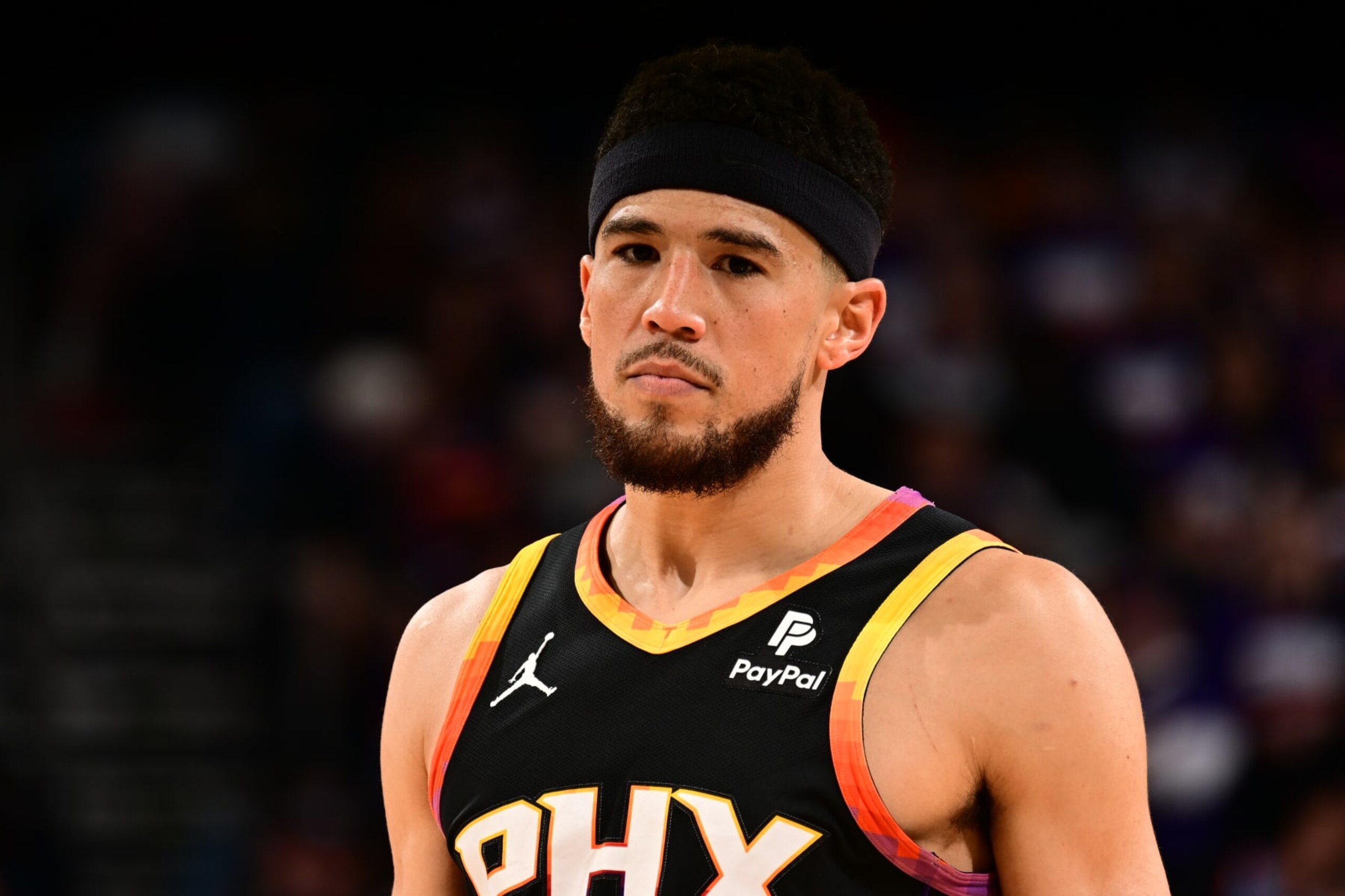PHOENIX, AZ - APRIL  26: Devin Booker #1 of the Phoenix Suns looks on during the game against the Minnesota Timberwolves on April 26, 2024 at Footprint Center in Phoenix, Arizona. NOTE TO USER: User expressly acknowledges and agrees that, by downloading and or using this photograph, user is consenting to the terms and conditions of the Getty Images License Agreement. Mandatory Copyright Notice: Copyright 2024 NBAE (Photo by Kate Frese/NBAE via Getty Images)
