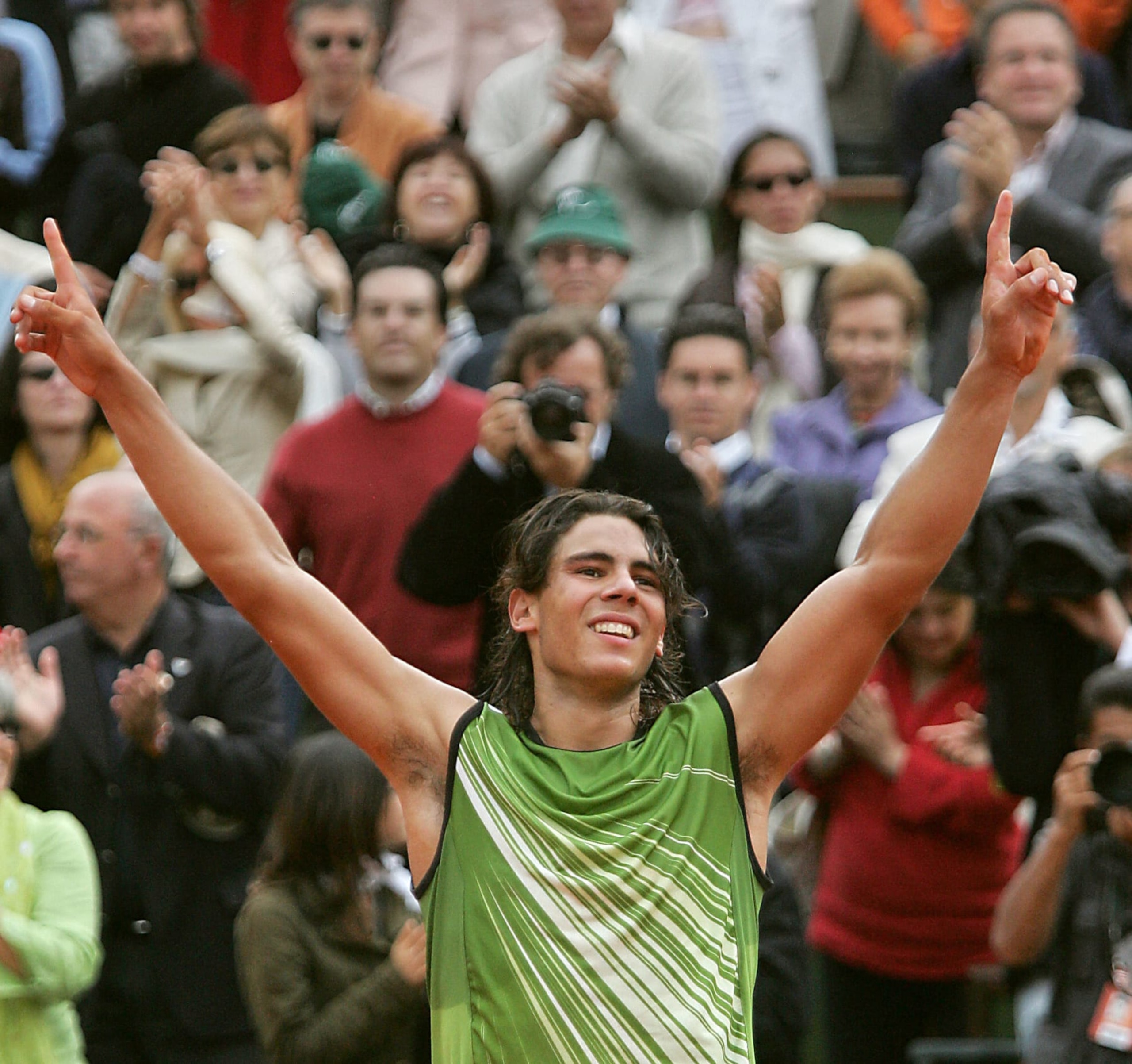 Spanish Rafael Nadal celebrates winning against Argentinian Mariano Puerta after their men's final match of the tennis French Open at Roland Garros, 05 June 2005 in Paris. Nadal won 6-7(6) 6-3 6-1 7-5. AFP PHOTO / THOMAS COEX (Photo by THOMAS COEX / AFP) (Photo by THOMAS COEX/AFP via Getty Images) Spanish Rafael Nadal celebrates winning against Argentinian Mariano Puerta after their men's final match of the tennis French Open at Roland Garros, 05 June 2005 in Paris. Nadal won 6-7(6) 6-3 6-1 7-5. AFP PHOTO / THOMAS COEX (Photo by THOMAS COEX / AFP) (Photo by THOMAS COEX/AFP via Getty Images)