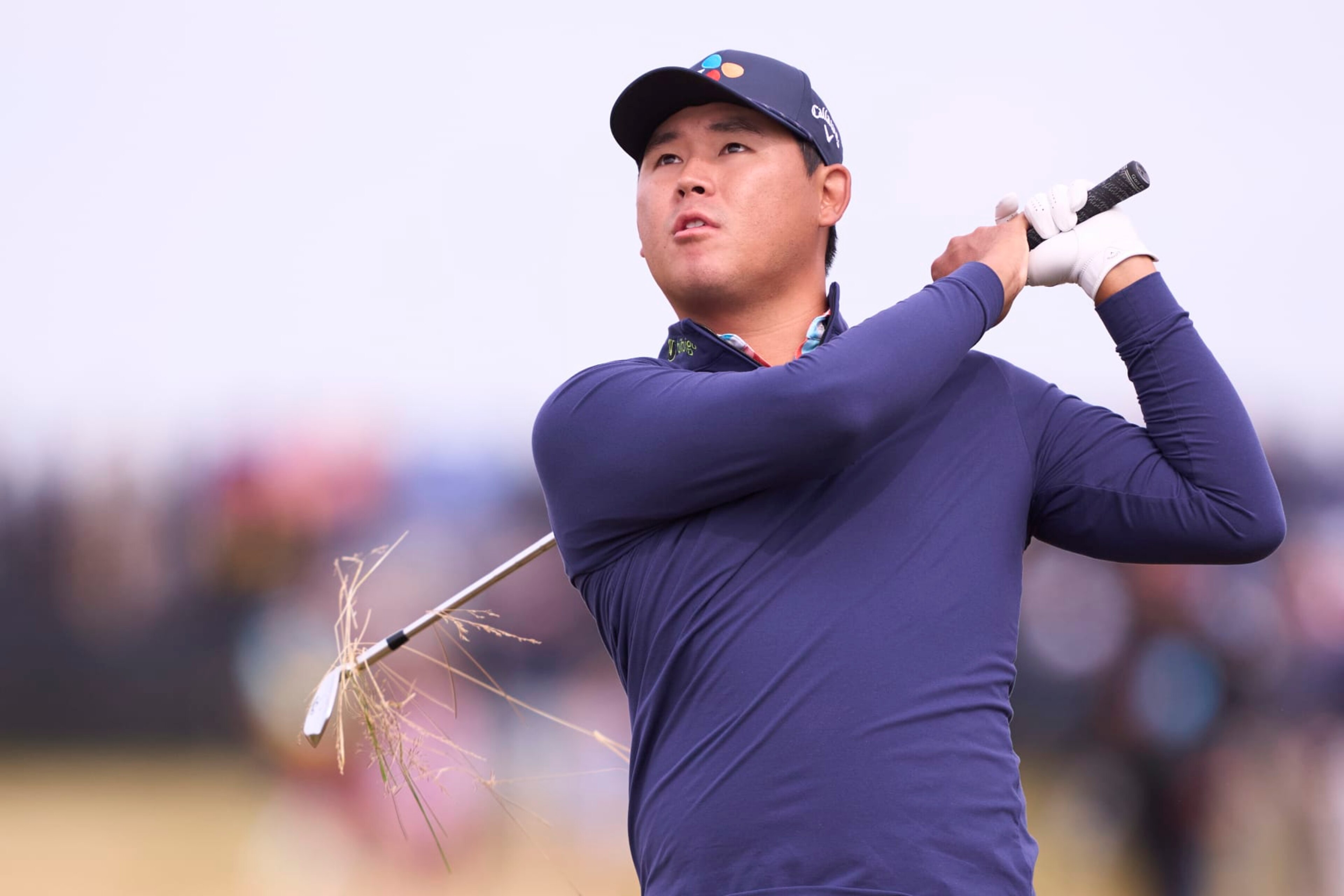 TROON, SCOTLAND - JULY 20: Si Woo Kim of South Korea plays his second shot on the 2nd hole on day three of The 152nd Open championship at Royal Troon on July 20, 2024 in Troon, Scotland. (Photo by Pedro Salado/Getty Images) TROON, SCOTLAND - JULY 20: Si Woo Kim of South Korea plays his second shot on the 2nd hole on day three of The 152nd Open championship at Royal Troon on July 20, 2024 in Troon, Scotland. (Photo by Pedro Salado/Getty Images)