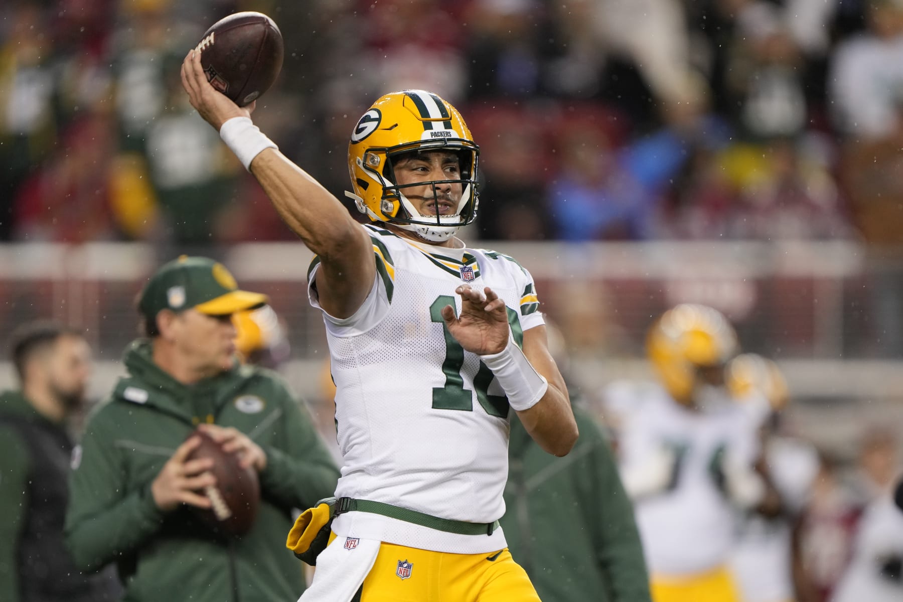 SANTA CLARA, CALIFORNIA - JANUARY 20: Jordan Love #10 of the Green Bay Packers warms up before the NFC Divisional Playoffs against the San Francisco 49ers at Levi's Stadium on January 20, 2024 in Santa Clara, California. (Photo by Thearon W. Henderson/Getty Images)