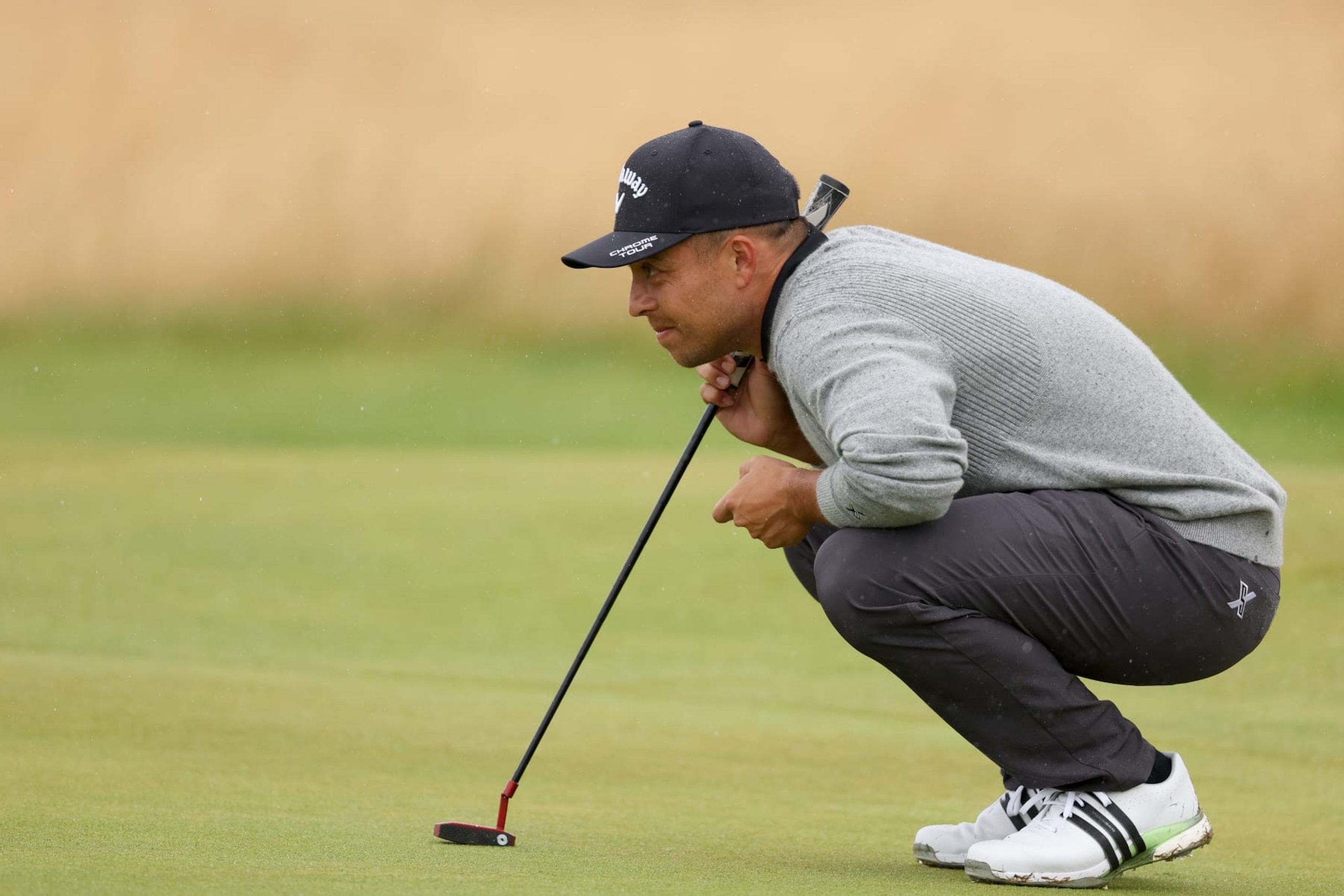 TROON, SCOTLAND - JULY 20: Xander Schauffele of the United States lines up a putt on the second green during day three of The 152nd Open championship at Royal Troon on July 20, 2024 in Troon, Scotland. (Photo by Kevin C. Cox/Getty Images) TROON, SCOTLAND - JULY 20: Xander Schauffele of the United States lines up a putt on the second green during day three of The 152nd Open championship at Royal Troon on July 20, 2024 in Troon, Scotland. (Photo by Kevin C. Cox/Getty Images)