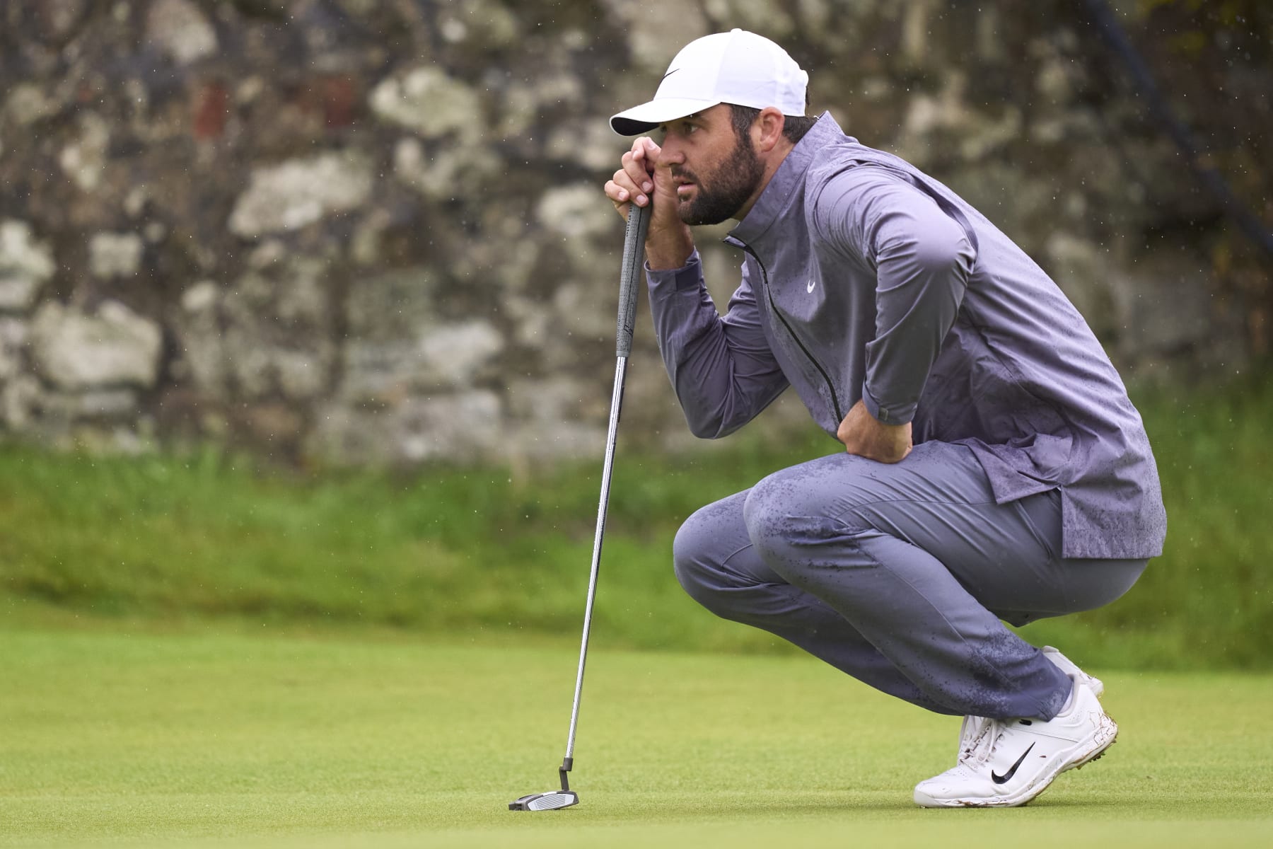 TROON, SCOTLAND - JULY 20: Scottie Scheffler of United States on the 11th green on day three of The 152nd Open championship at Royal Troon on July 20, 2024 in Troon, Scotland. (Photo by Pedro Salado/Getty Images)