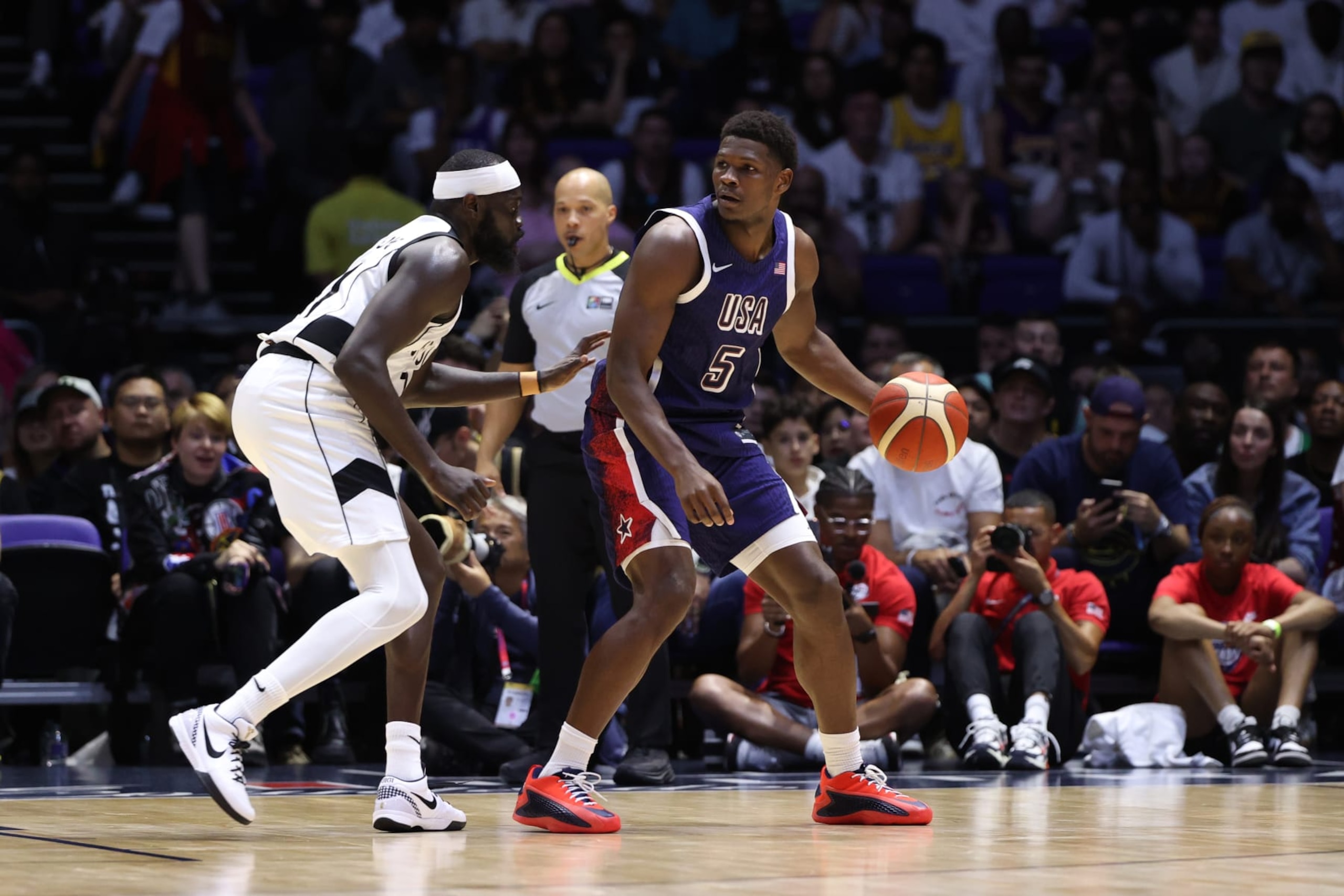 LONDON, ENGLAND - JULY 20: Anthony Edwards #5 of Team USA handles the ball during the game against South Sudan as part of the 2024 USA Basketball Showcase on July 20, 2024 in London, England at O2 Arena. NOTE TO USER: User expressly acknowledges and agrees that, by downloading and/or using this photograph, user is consenting to the terms and conditions of the Getty Images License Agreement. Mandatory Copyright Notice: Copyright 2024 NBAE (Photo by Joe Murphy/NBAE via Getty Images)