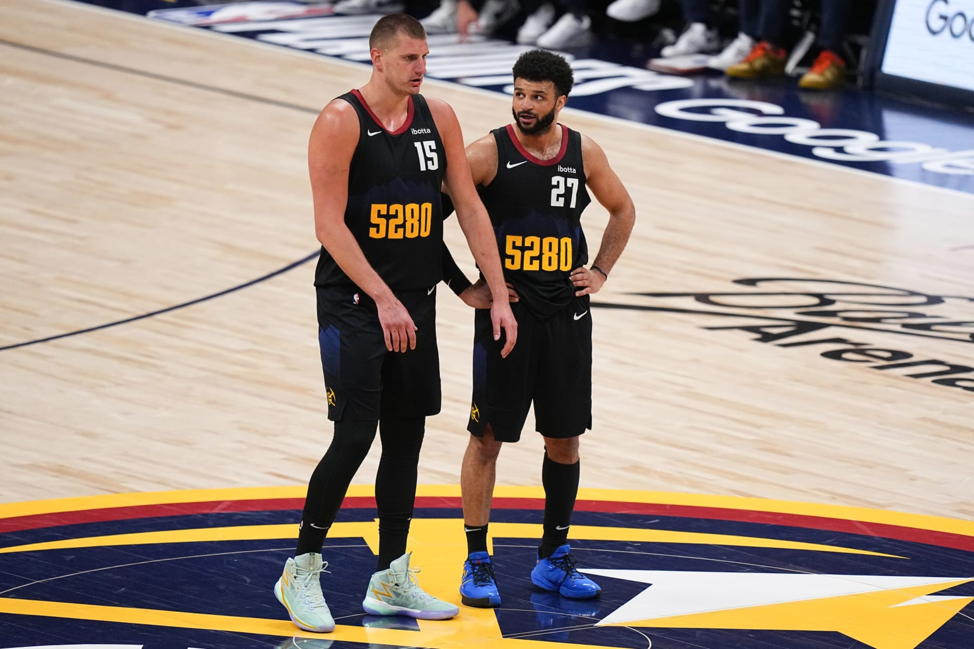 DENVER, CO - MAY 19: Nikola Jokic #15 talks to Jamal Murray #27 of the Denver Nuggets during the game against the Minnesota Timberwolves during Round 2 Game 7 of the 2024 NBA Playoffs on May 19, 2024 at the Ball Arena in Denver, Colorado. NOTE TO USER: User expressly acknowledges and agrees that, by downloading and/or using this Photograph, user is consenting to the terms and conditions of the Getty Images License Agreement. Mandatory Copyright Notice: Copyright 2023 NBAE (Photo by Bart Young/NBAE via Getty Images) DENVER, CO - MAY 19: Nikola Jokic #15 talks to Jamal Murray #27 of the Denver Nuggets during the game against the Minnesota Timberwolves during Round 2 Game 7 of the 2024 NBA Playoffs on May 19, 2024 at the Ball Arena in Denver, Colorado. NOTE TO USER: User expressly acknowledges and agrees that, by downloading and/or using this Photograph, user is consenting to the terms and conditions of the Getty Images License Agreement. Mandatory Copyright Notice: Copyright 2023 NBAE (Photo by Bart Young/NBAE via Getty Images)