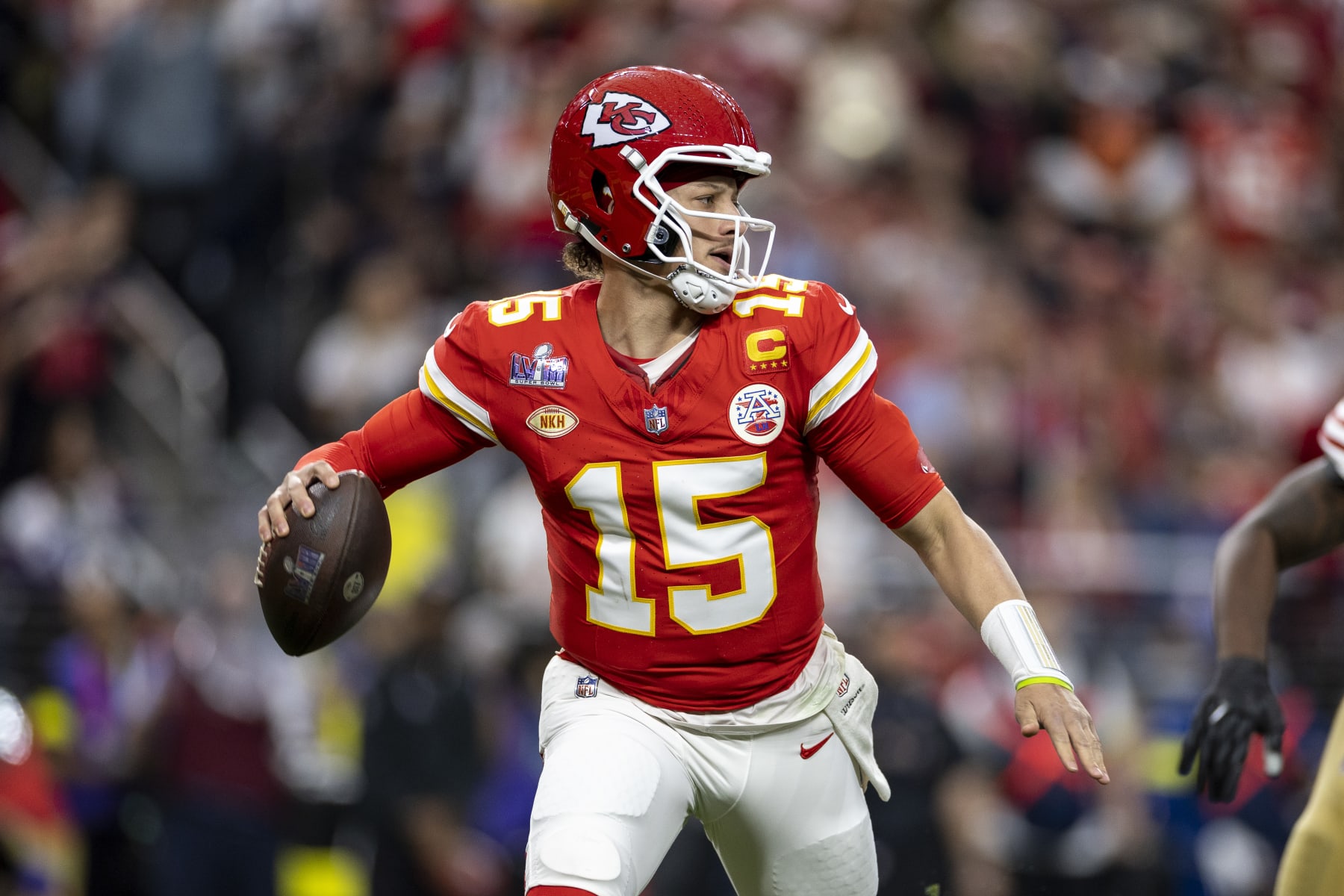 LAS VEGAS, NEVADA - FEBRUARY 11: Patrick Mahomes #15 of the Kansas City Chiefs scrambles and looks to pass during the NFL Super Bowl 58 football game between the San Francisco 49ers and the Kansas City Chiefs at Allegiant Stadium on February 11, 2024 in Las Vegas, Nevada. (Photo by Michael Owens/Getty Images)